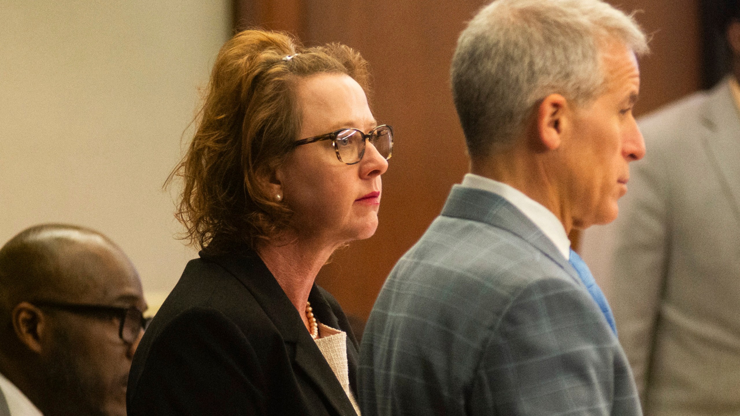 Jackie Johnson stands with her defense lawyer Brian Steel in the first day of her defense in her trial on the single remaining charge of violating her oath of office, Tuesday, Feb. 4, 2025, in Brunswick, Ga. (Terry Dickson/The Brunswick News via AP, Pool)