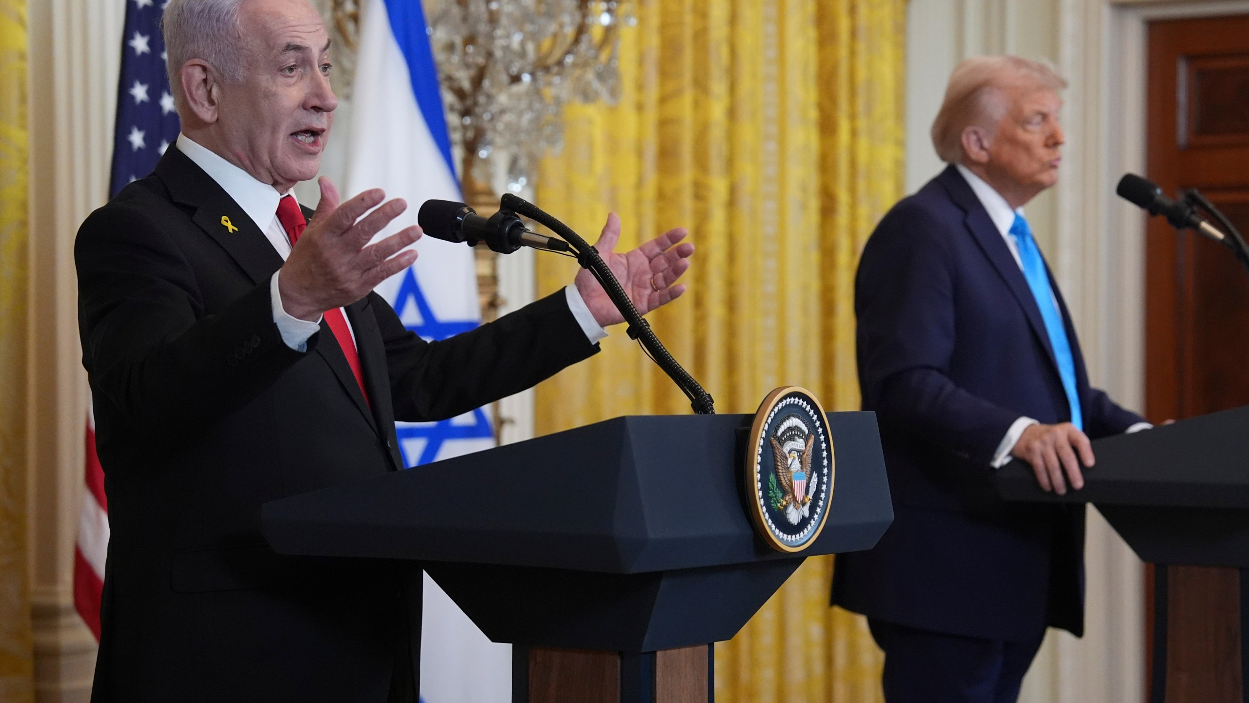 President Donald Trump and Israel's Prime Minister Benjamin Netanyahu participate in a news conference in the East Room of the White House, Tuesday, Feb. 4, 2025, in Washington. (AP Photo/Evan Vucci)