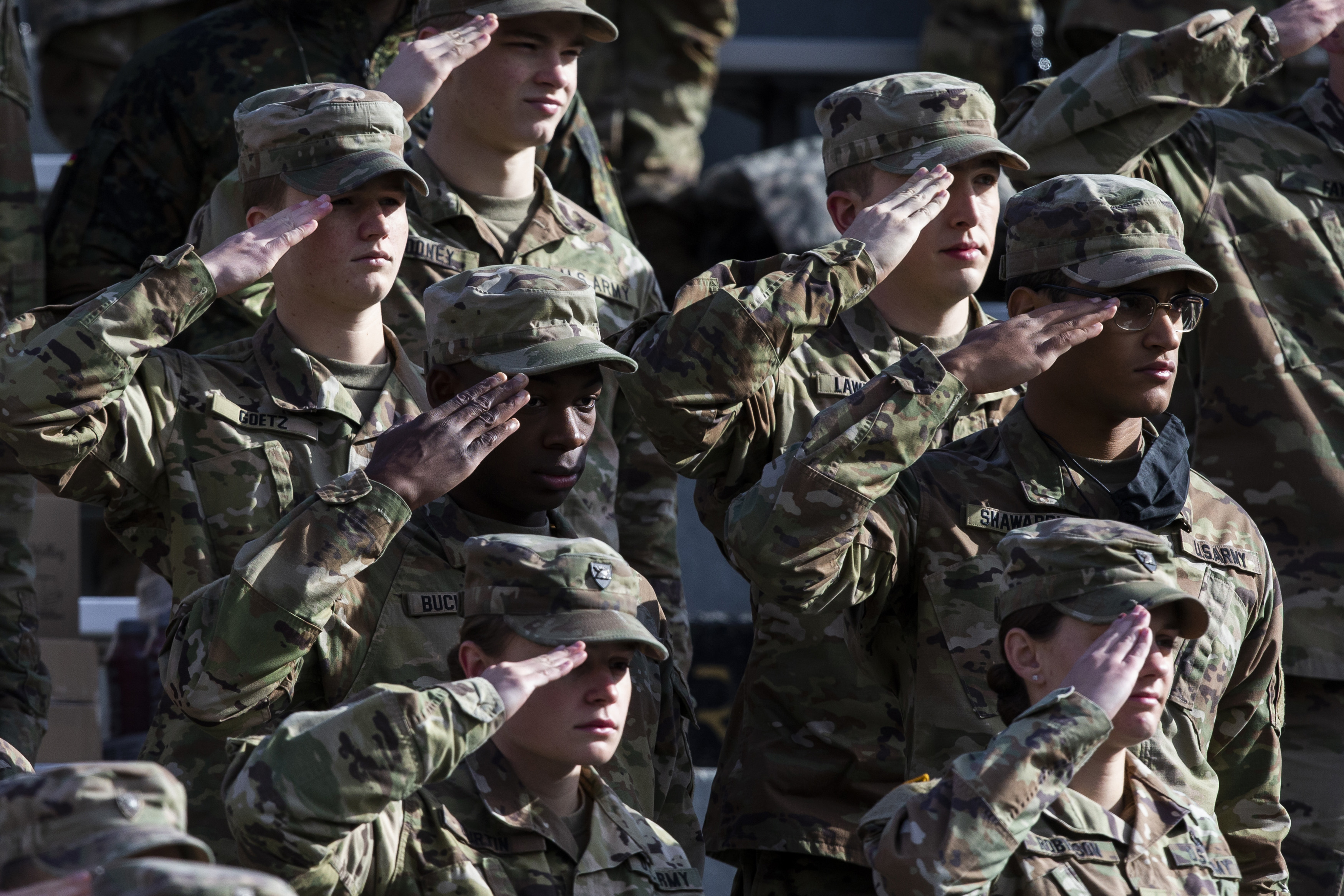 FILE - West Point cadets salute during the National Anthem prior to the NCAA college football game between the Army Black Knights and Massachusetts at Michie Stadium, Saturday, Nov. 20, 2021, in West Point, N.Y. (AP Photo/Eduardo Munoz Alvarez, File)