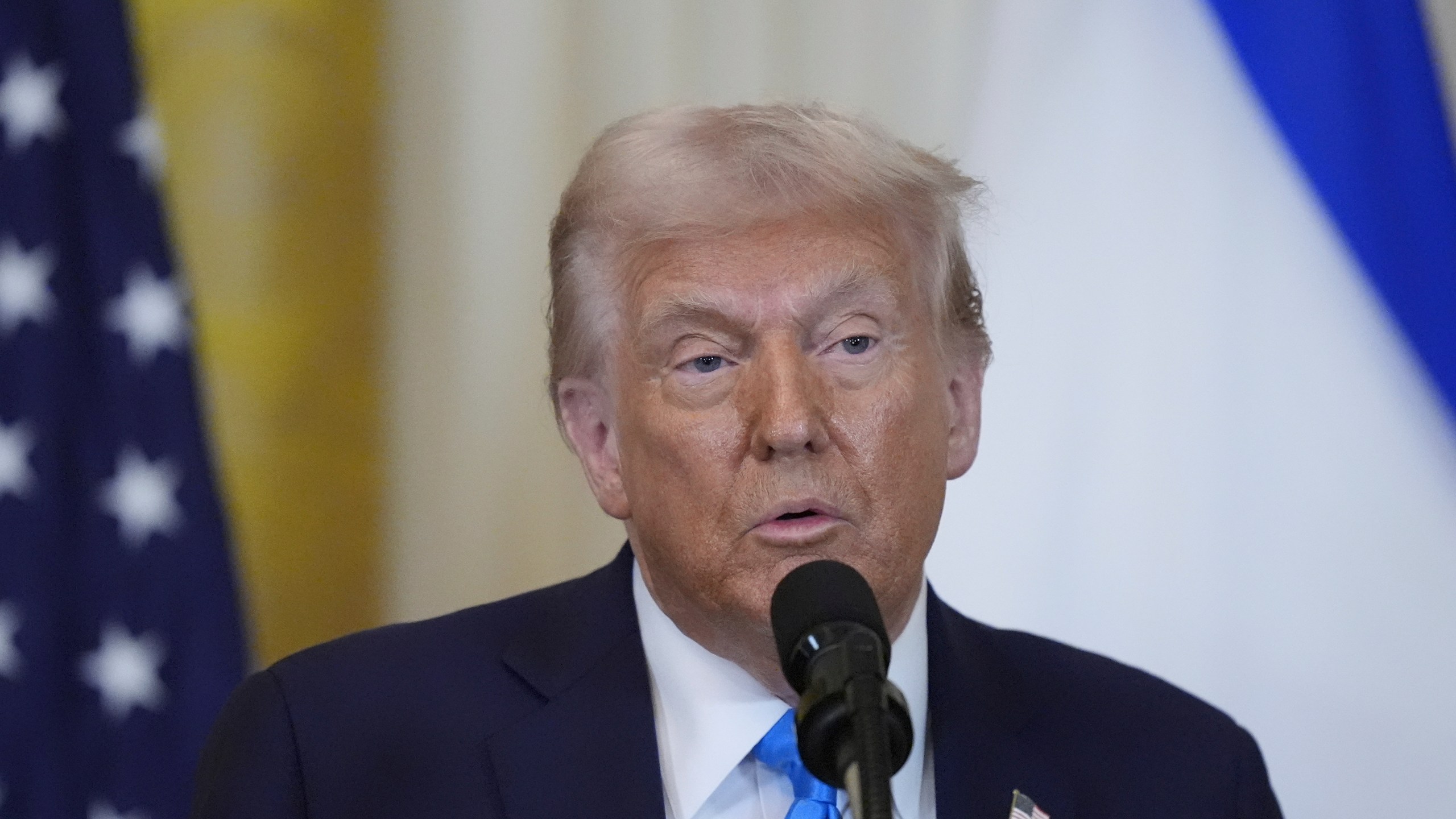 President Donald Trump speaks with Israeli Prime Minister Benjamin Netanyahu during a news conference in the East Room of the White House, Tuesday, Feb. 4, 2025, in Washington. (AP Photo/Alex Brandon)