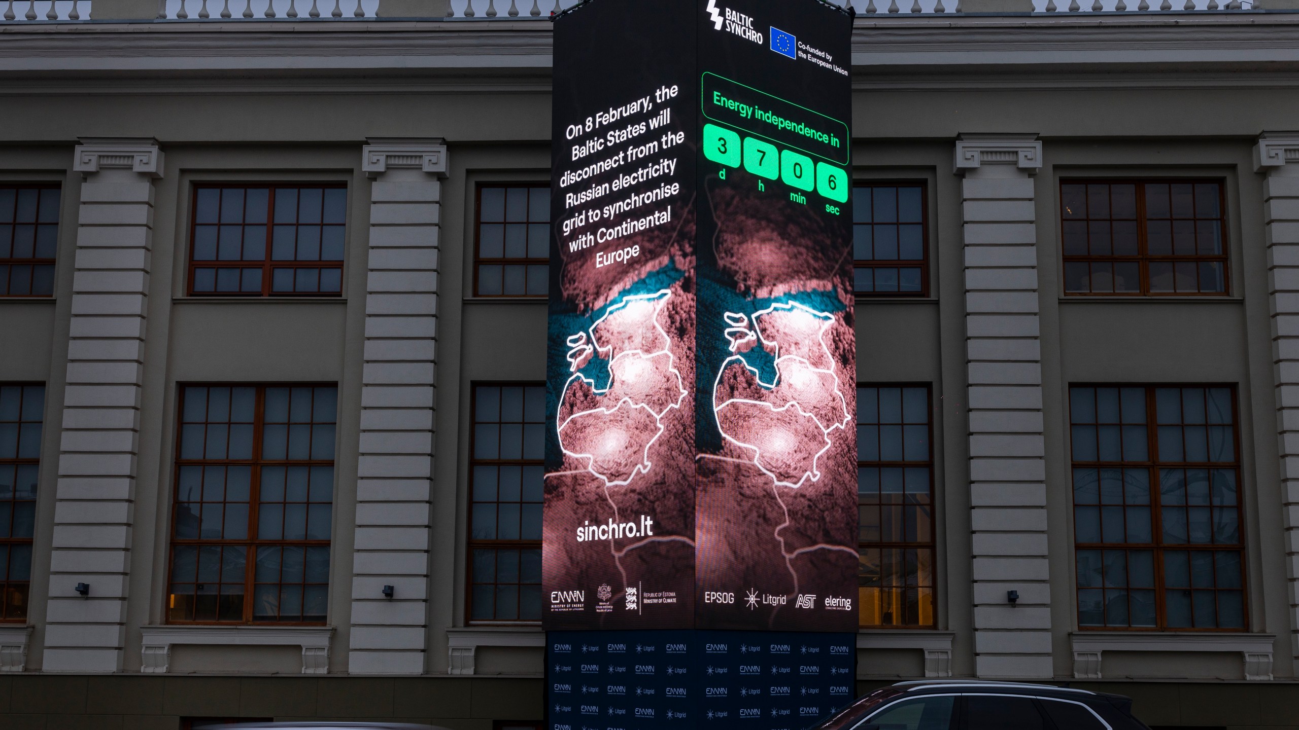 A screen near the Energy Museum and Mindaugas Bridge indicates that on February 8 the Baltic States will disconnect from the Russian electricity grid to synchronise with Continental Europe, in Vilnius, Lithuania, Tuesday, Feb. 4, 2025. (AP Photo/Mindaugas Kulbis)