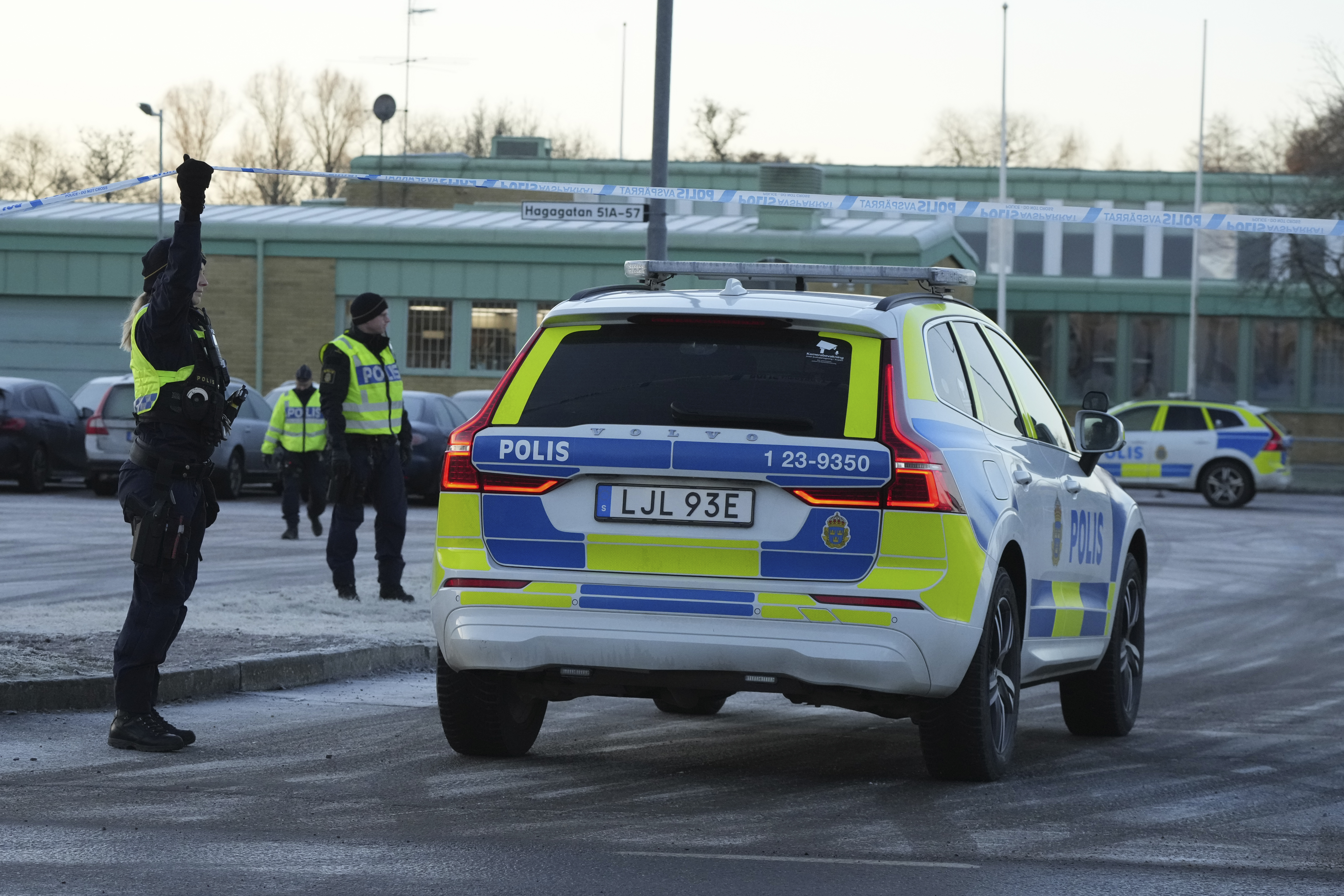 Police guard near the scene of a shooting at an adult education center on the outskirts of Orebro, Sweden, Thursday, Feb. 6, 2025. (AP Photo/Sergei Grits)