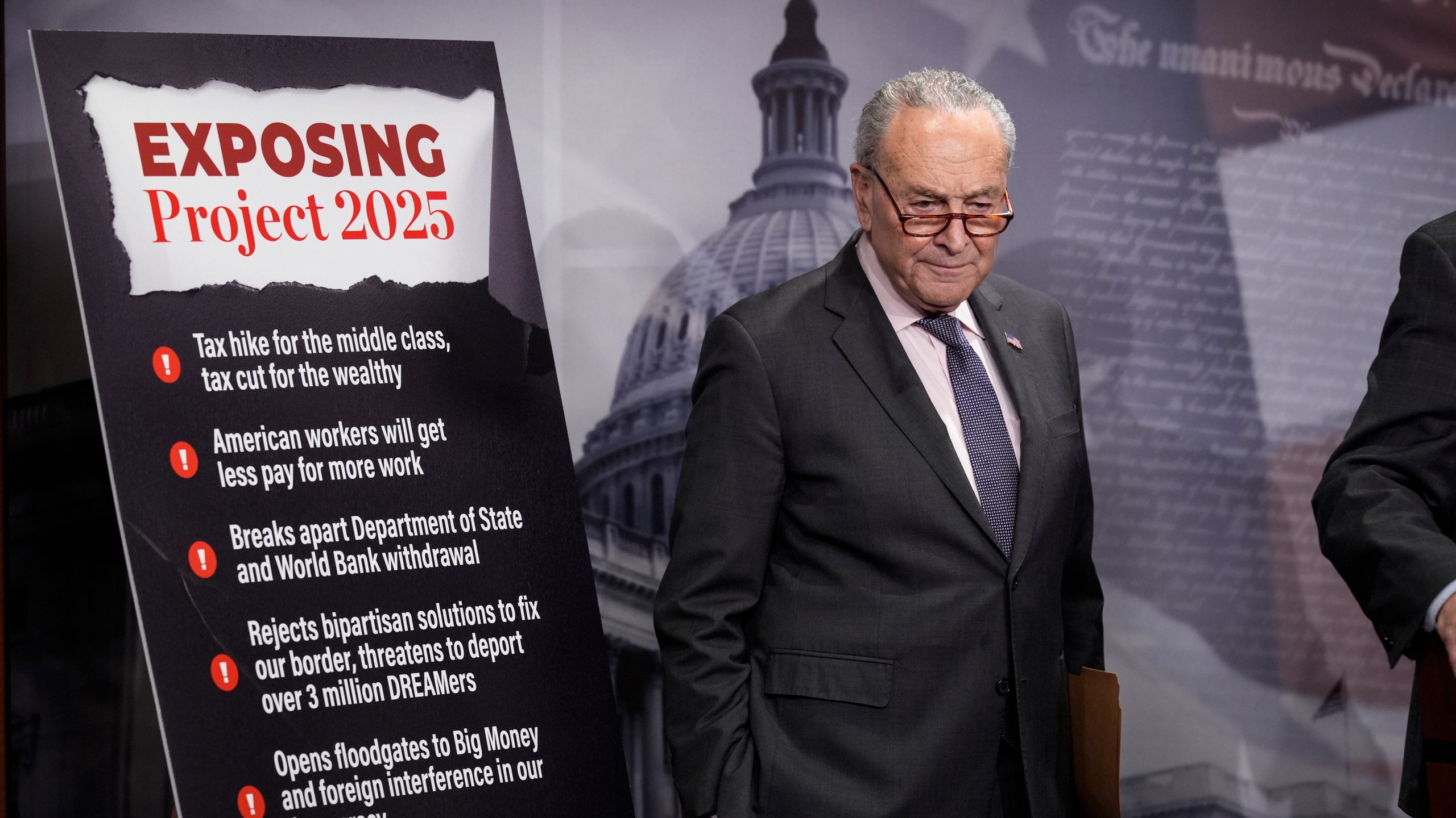 Senate Minority Leader Chuck Schumer, D-N.Y., joined by members of the Senate Budget Committee, criticizes Russ Vought, an author of the conservative handbook Project 2025 and President Donald Trump's pick to run the Office of Management and Budget, at a news conference at the Capitol in Washington, Thursday, Jan. 23, 2025. (AP Photo/J. Scott Applewhite)