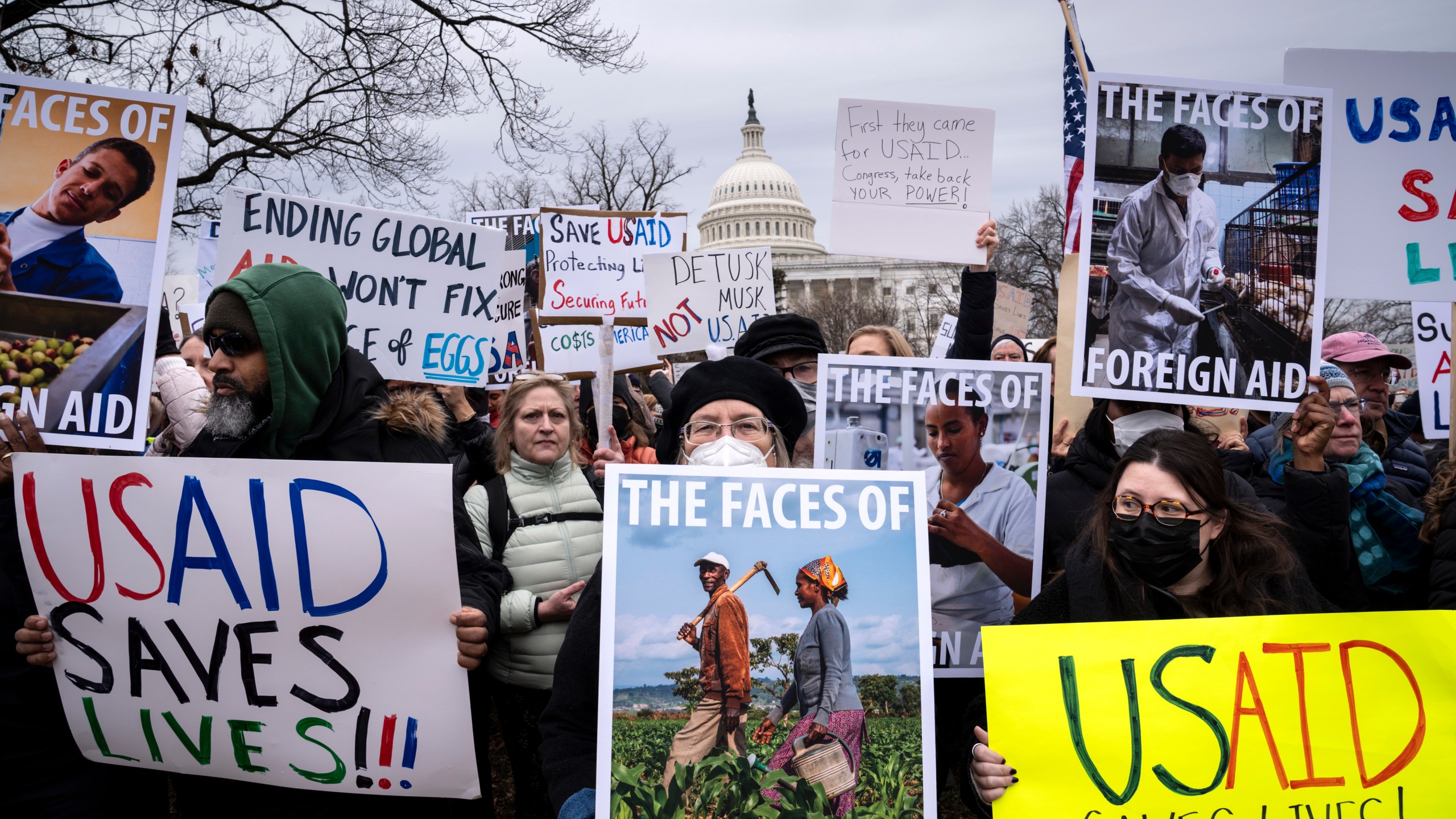 Demonstrators and lawmakers rally against President Donald Trump and his ally Elon Musk as they disrupt the federal government, including dismantling the U.S. Agency for International Development, which administers foreign aid approved by Congress, on Capitol Hill in Washington, Wednesday, Feb. 5, 2025. (AP Photo/J. Scott Applewhite)