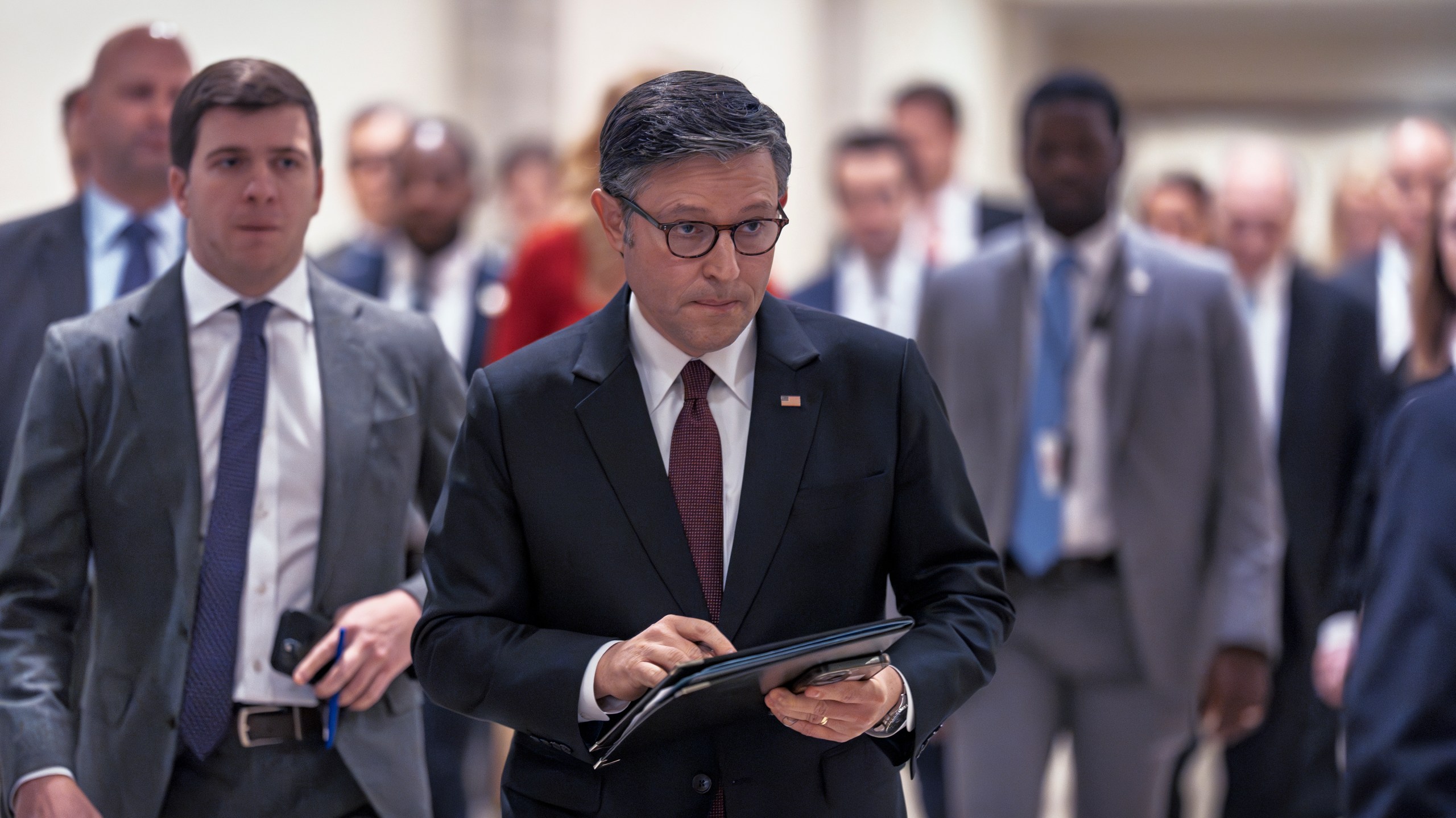 Speaker of the House Mike Johnson, R-La., arrives to speak with reporters to discuss the Trump agenda following a closed-door strategy session, at the Capitol in Washington, Wednesday, Feb. 5, 2025. (AP Photo/J. Scott Applewhite)