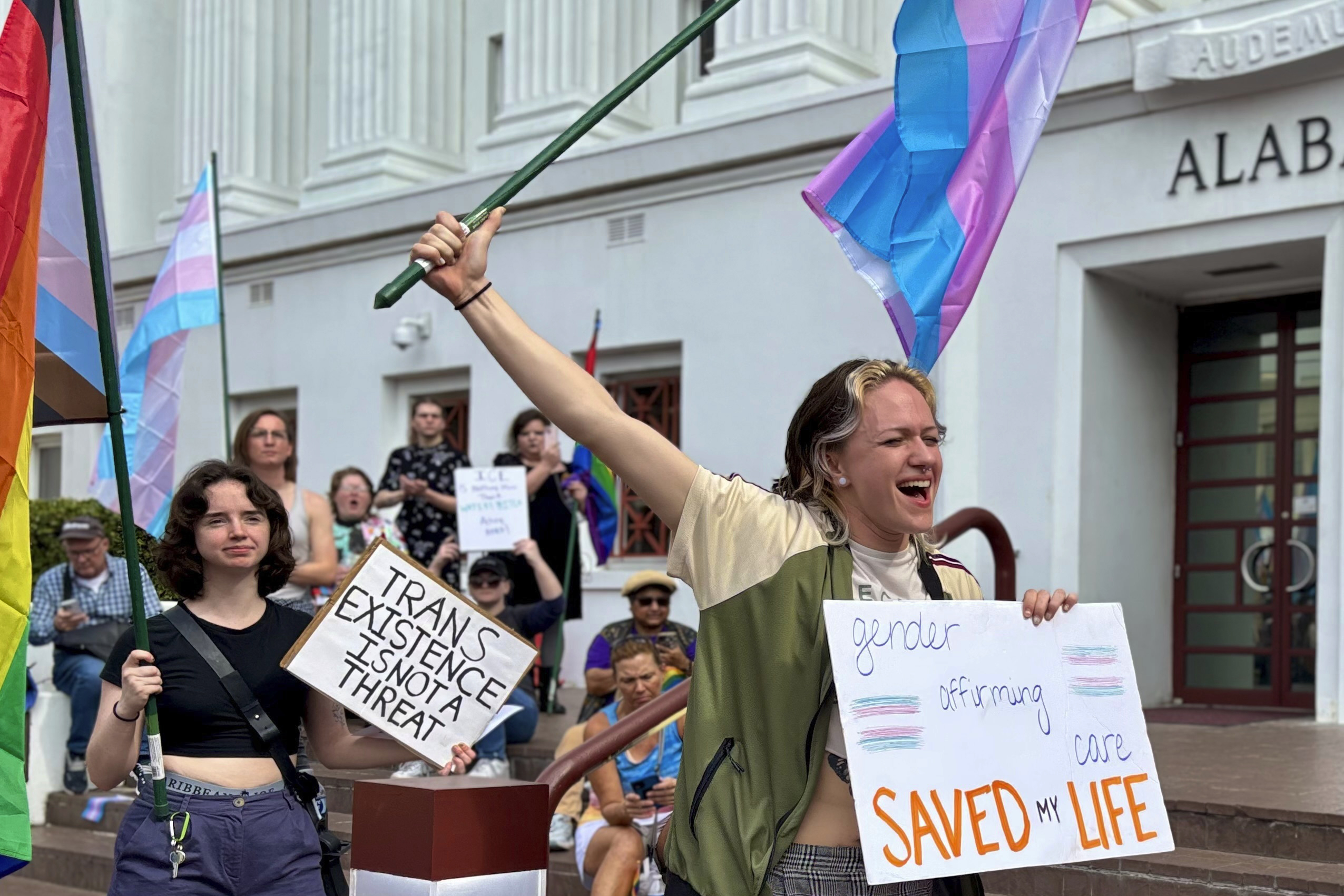 Demonstrators march to the Alabama Capitol in Montgomery, Ala., on Feb. 5, 2025 to protest bills that would impact transgender people. (AP Photo/Kim Chandler)