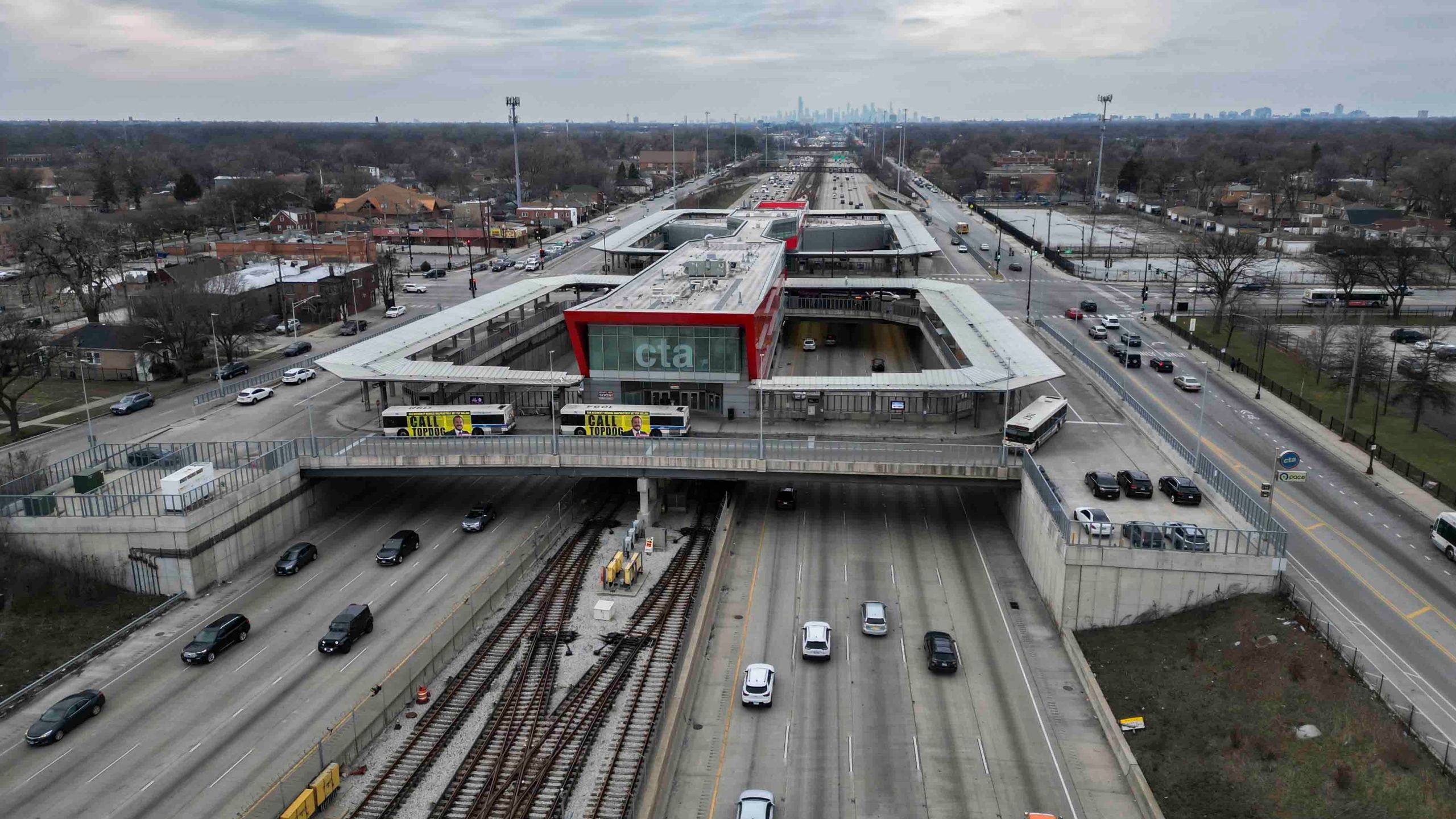 FILE - Cars pass the 95th Street Red Line Station, the train station currently the farthest south on the line and where the Chicago Transit Authority plans to extend from in 2025, Thursday, Dec. 19, 2024, in Chicago. (AP Photo/Erin Hooley, File)