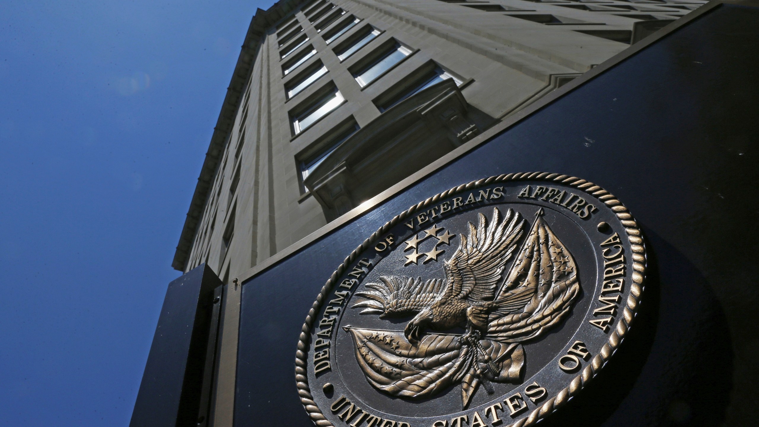 FILE - The seal is seen at the Department of Veterans Affairs building in Washington, June 21, 2013. (AP Photo/Charles Dharapak, File)