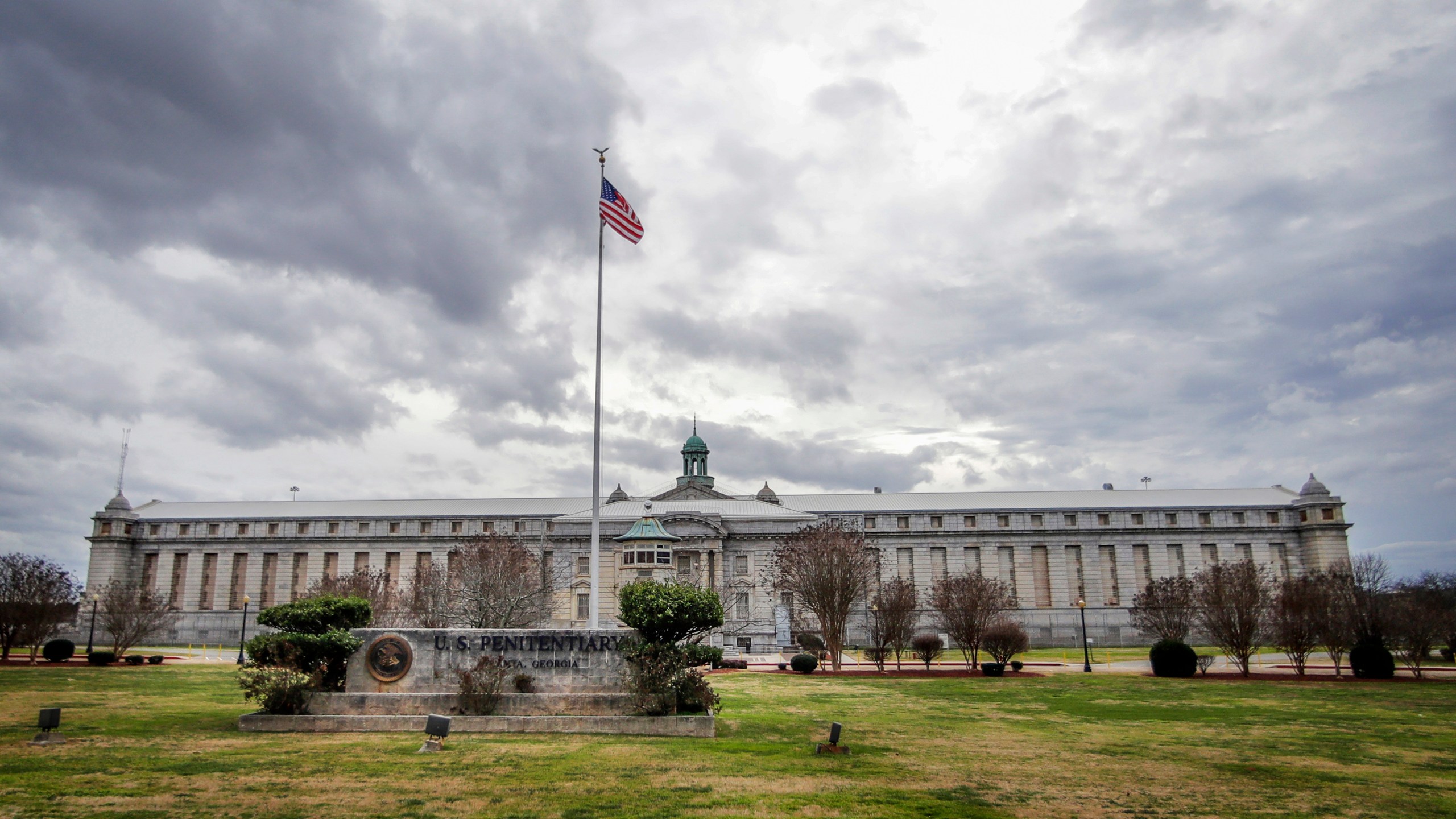 FILE - The Atlanta Federal Penitentiary, Wednesday, Feb. 5, 2020, in Atlanta. (AP Photo/John Bazemore, File)