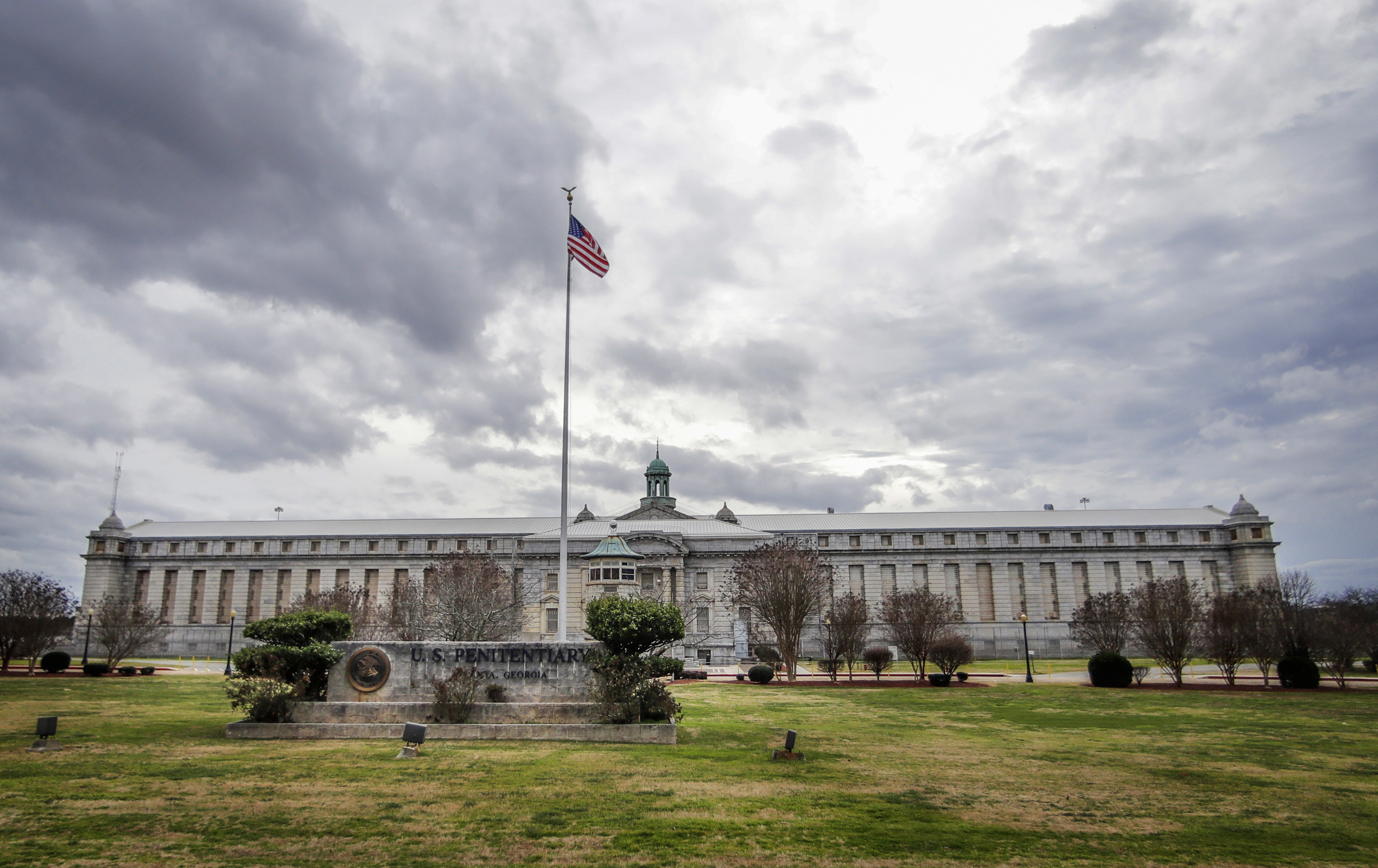 FILE - The Atlanta Federal Penitentiary, Wednesday, Feb. 5, 2020, in Atlanta. (AP Photo/John Bazemore, File)