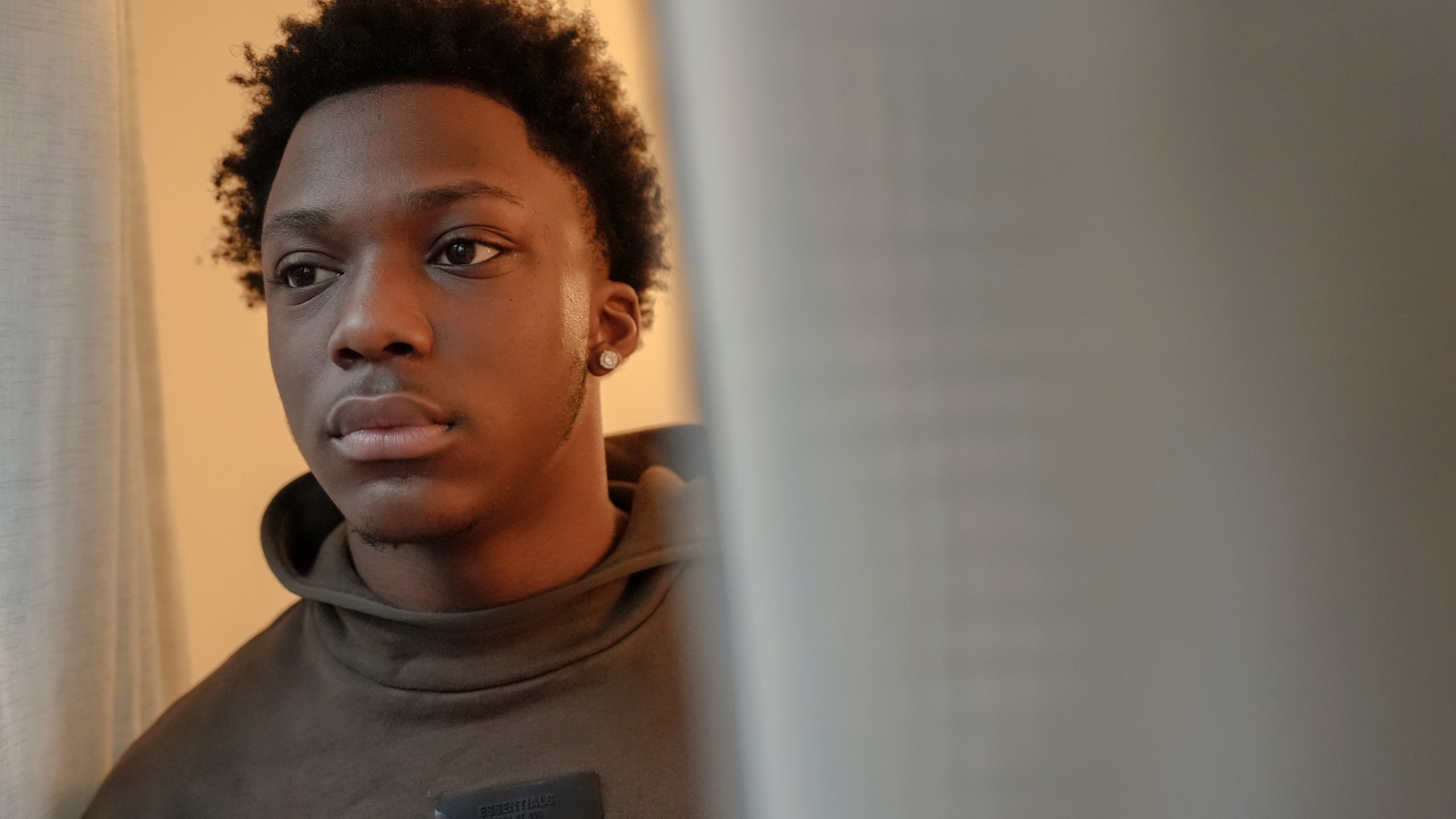 Camden Lee, 16, poses for a portrait at his family's apartment, Tuesday, Jan. 28, 2025, in the Brooklyn borough of New York. (AP Photo/Julia Demaree Nikhinson)