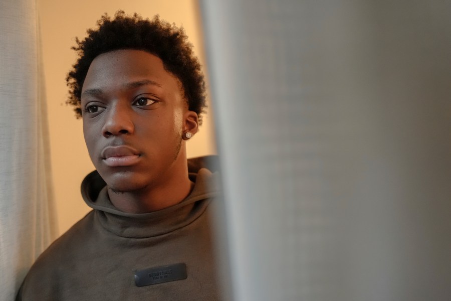 Camden Lee, 16, poses for a portrait at his family's apartment, Tuesday, Jan. 28, 2025, in the Brooklyn borough of New York. (AP Photo/Julia Demaree Nikhinson)