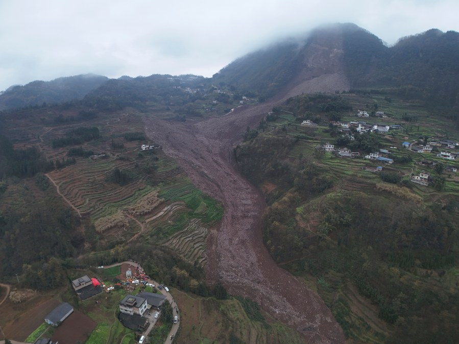 In this photo released by Xinhua News Agency, an aerial drone photo shows the site of a landslide in Jinping Village, Junlian County in the city of Yibin, southwest China's Sichuan Province, Saturday Feb. 8, 2025. (Zeng Li/Xinhua via AP)