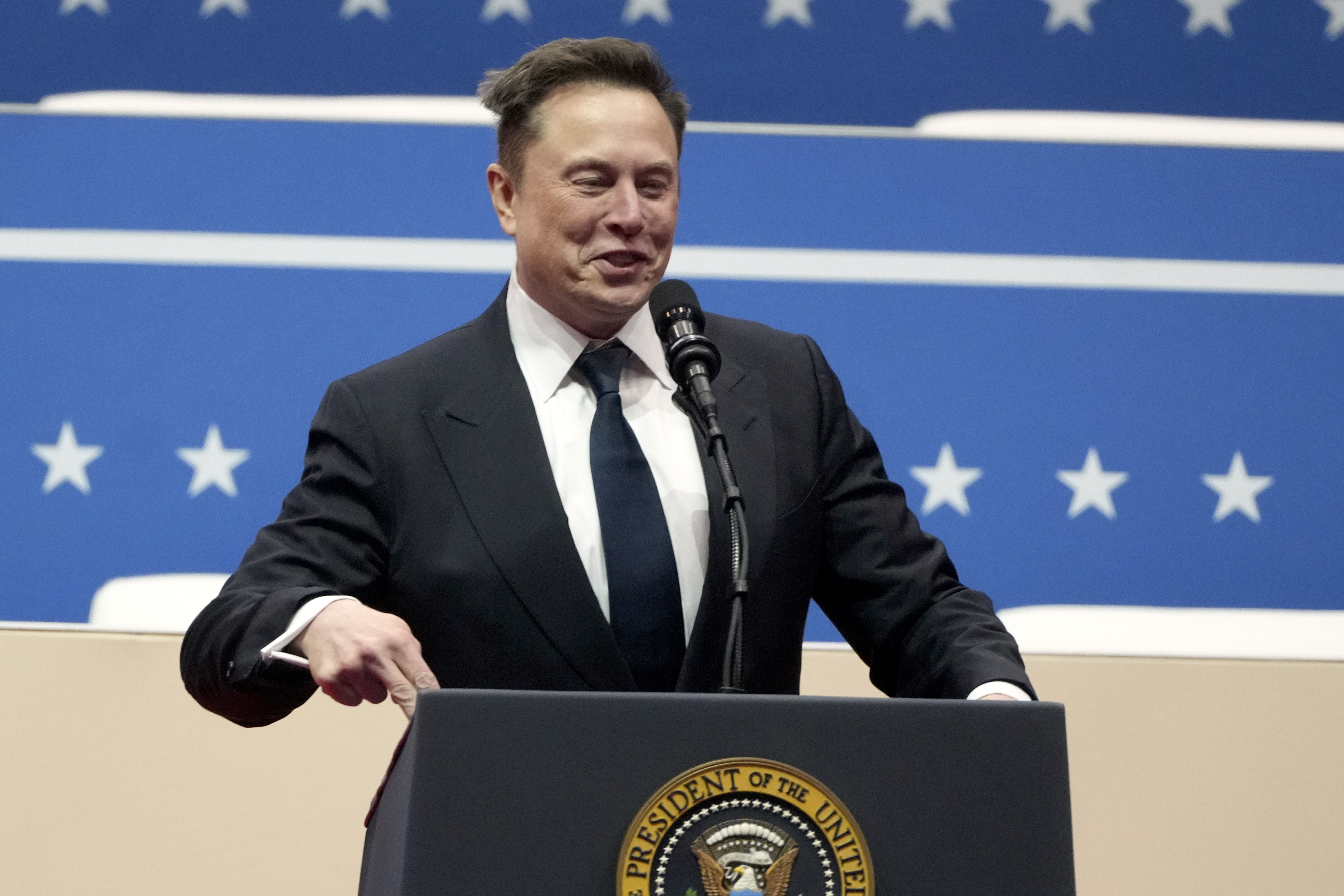 FILE - Elon Musk speaks at an indoor Presidential Inauguration parade event in Washington, Jan. 20, 2025. (AP Photo/Matt Rourke, File)