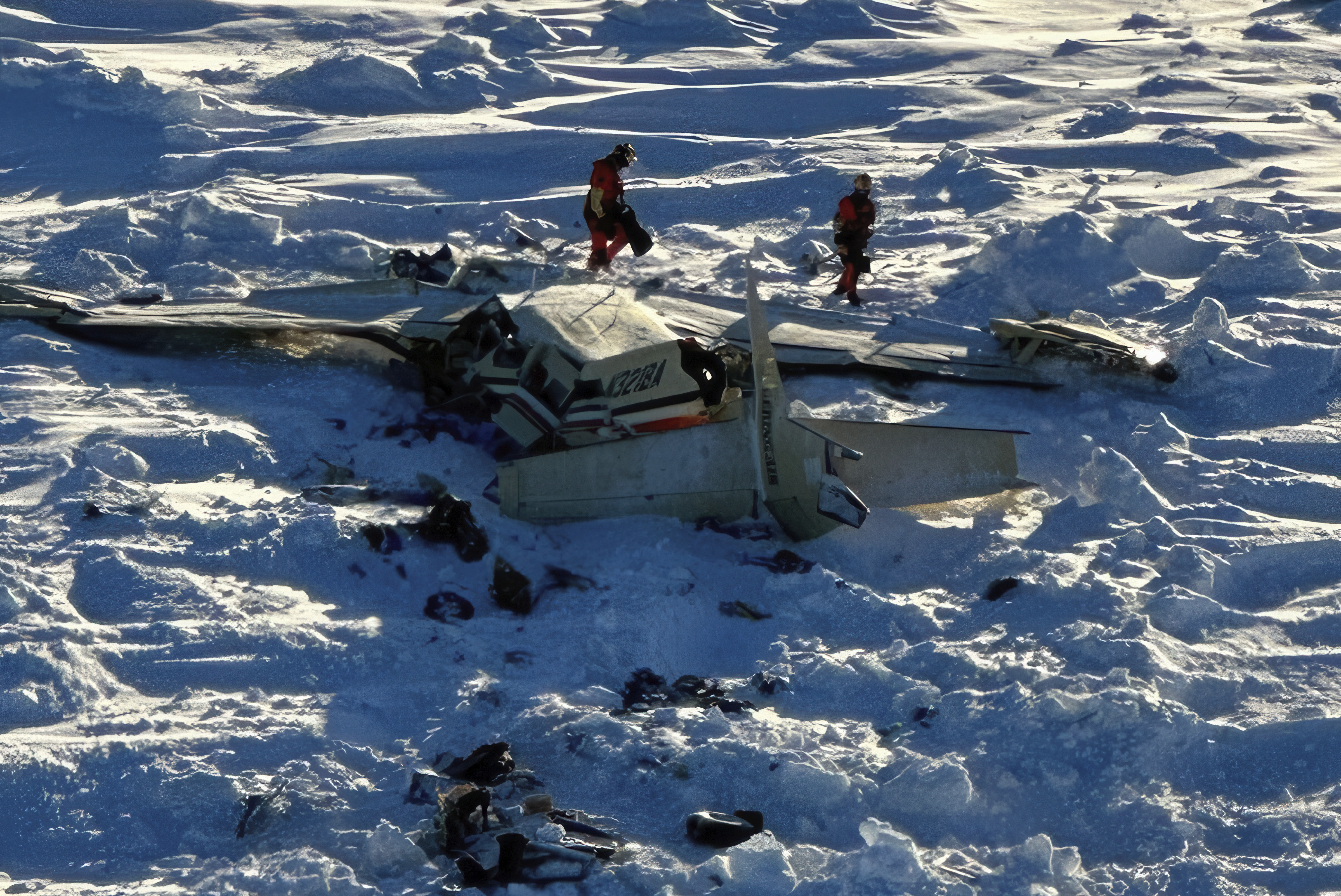 This photo provided by the U.S. Coast Guard on Friday, Feb. 7, 2025, shows a small commuter plane that crashed in western Alaska on a flight that was bound for the hub community of Nome. (U.S. Coast Guard via AP)