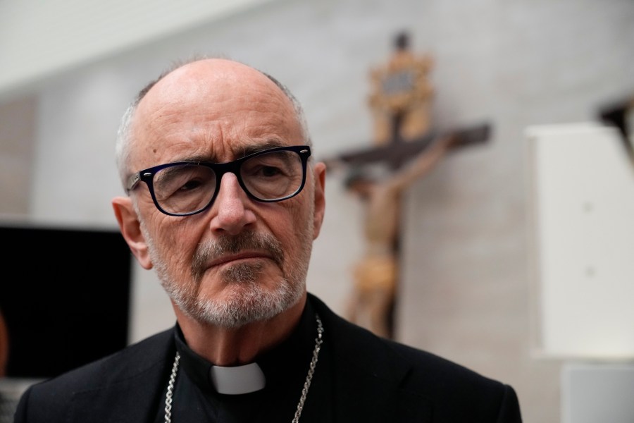 FILE - Cardinal Michael Czerny meets with journalists at the Vatican press hall, in Rome, on March 30, 2023. (AP Photo/Gregorio Borgia, File)