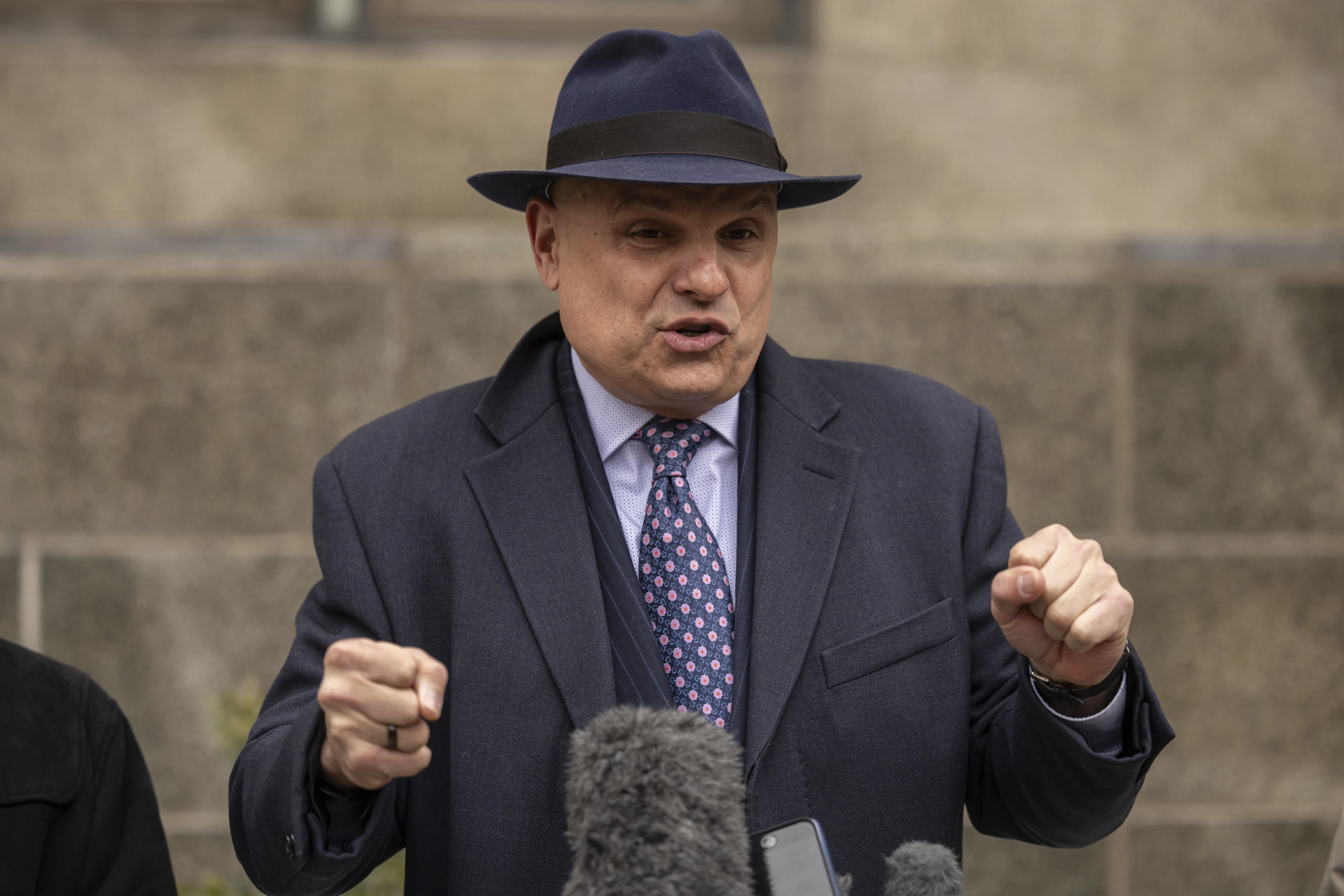 Arthur Aidala, attorney for Steve Bannon, speaks to the members of media outside court in New York, Tuesday, Feb. 11, 2025. (AP Photo/Yuki Iwamura)