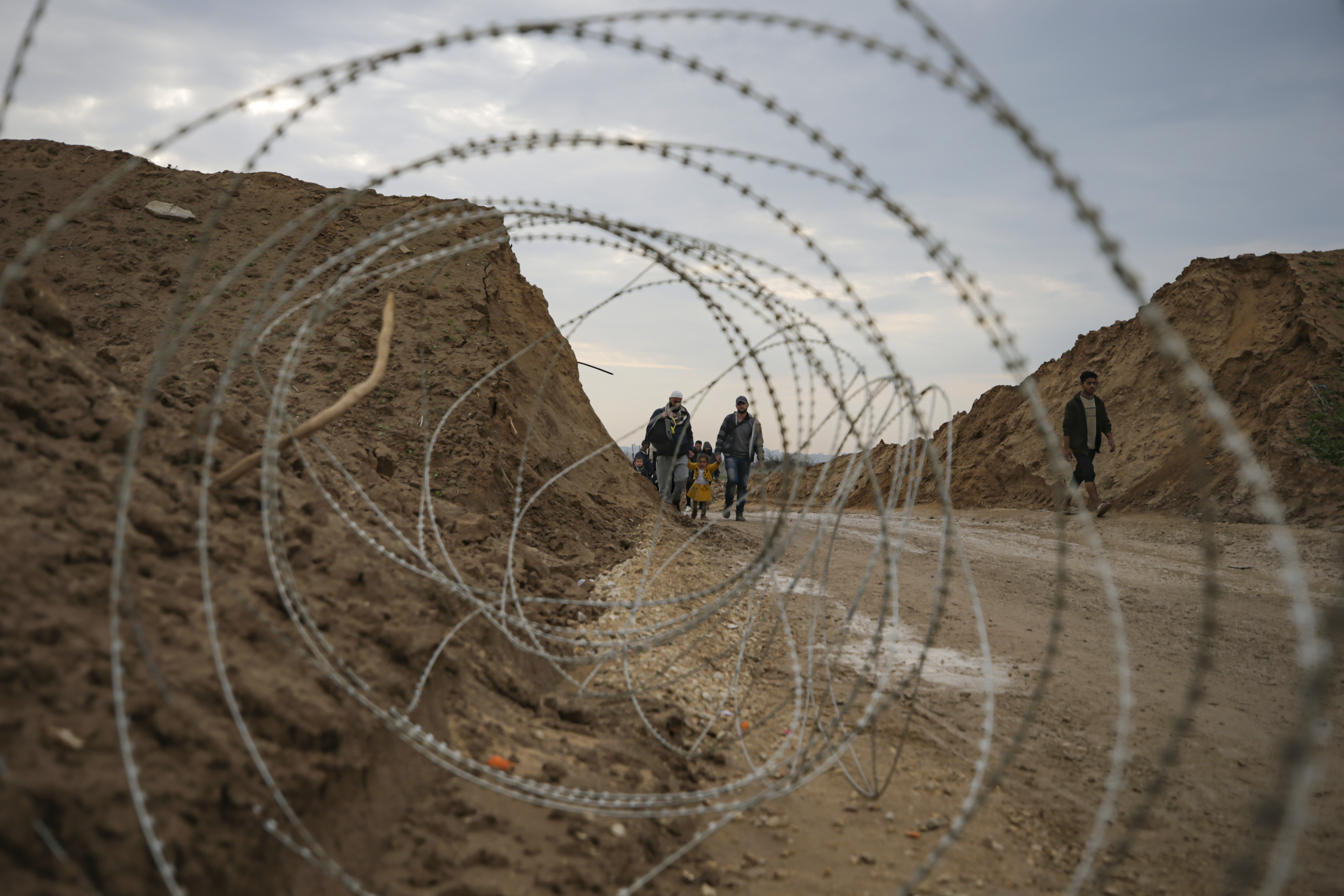 Displaced Palestinians make their way from central Gaza to their homes in the northern Gaza Strip, Monday, Feb. 10, 2025. (AP Photo/Jehad Alshrafi)