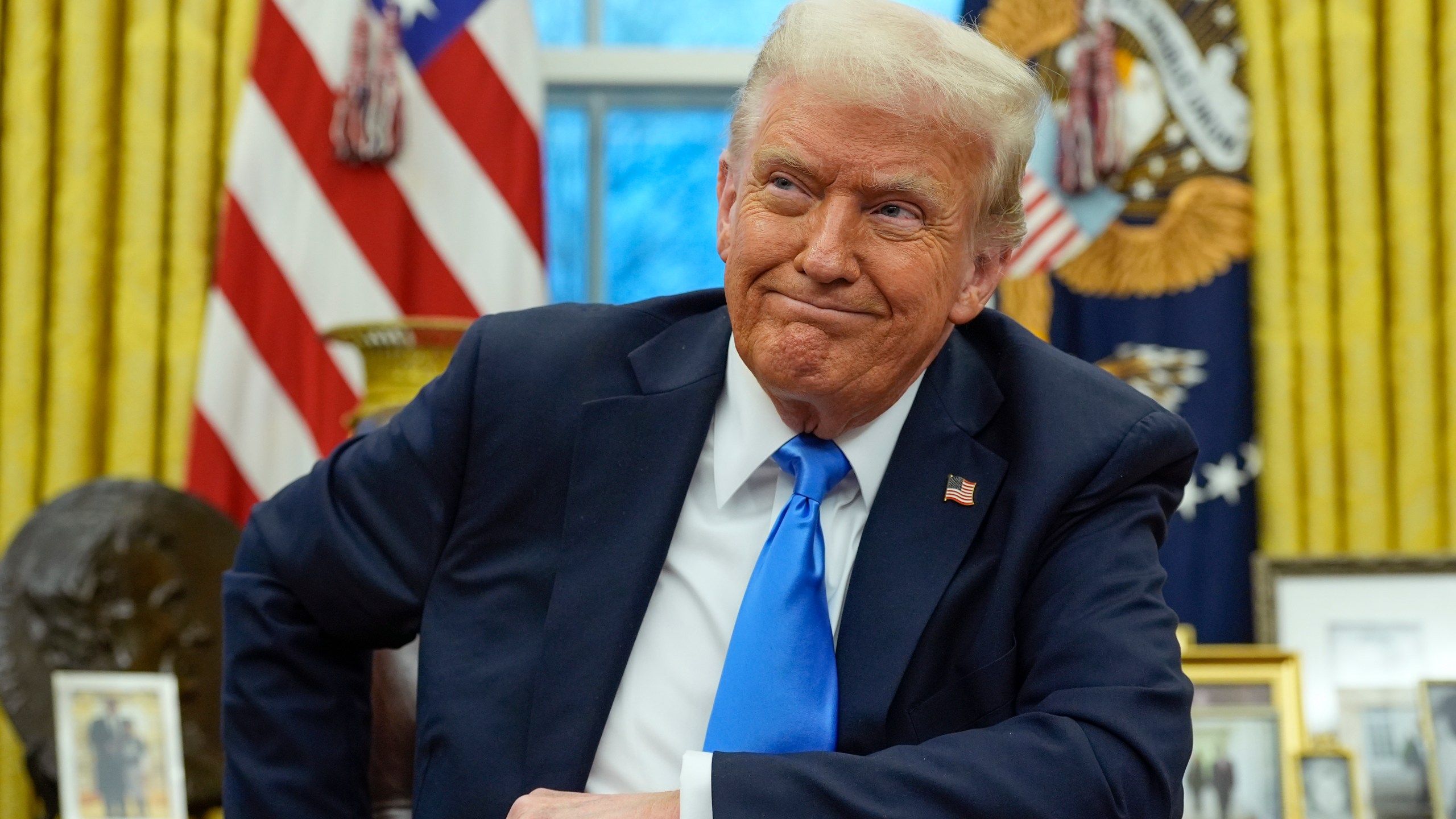 President Donald Trump speaks with reporters in the Oval Office at the White House, Tuesday, Feb. 11, 2025, in Washington. (Photo/Alex Brandon)