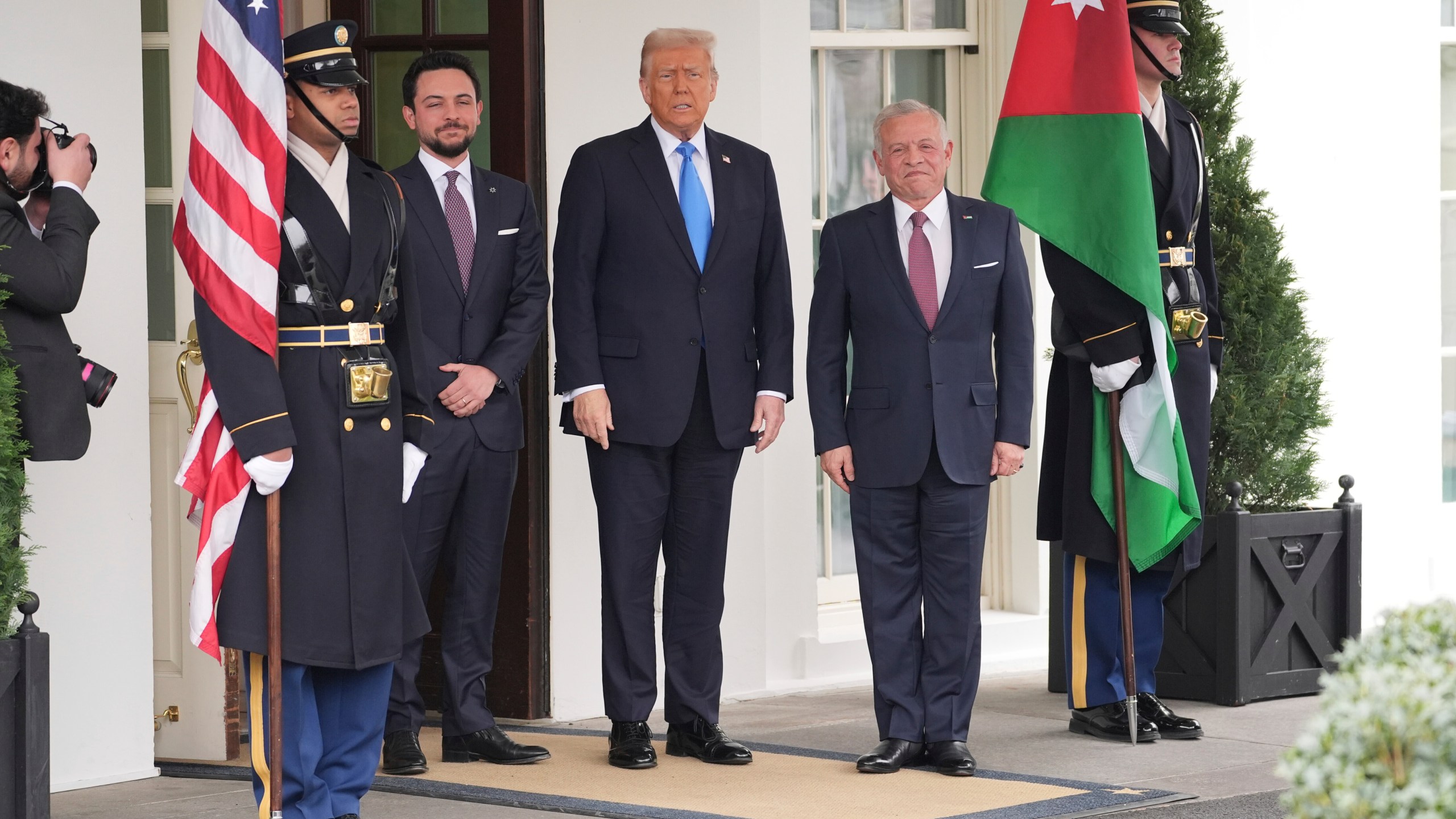 President Donald Trump greets Jordan's King Abdullah II, right, and Crown Prince Hussein at the White House, Tuesday, Feb. 11, 2025, in Washington. (AP Photo/Evan Vucci)