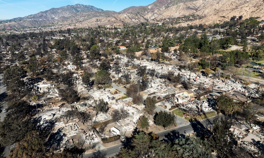 FILE - Residences destroyed by the Eaton Fire line a neighborhood in Altadena, Calif., on Tuesday, Jan. 21, 2025. (AP Photo/Noah Berger, File)