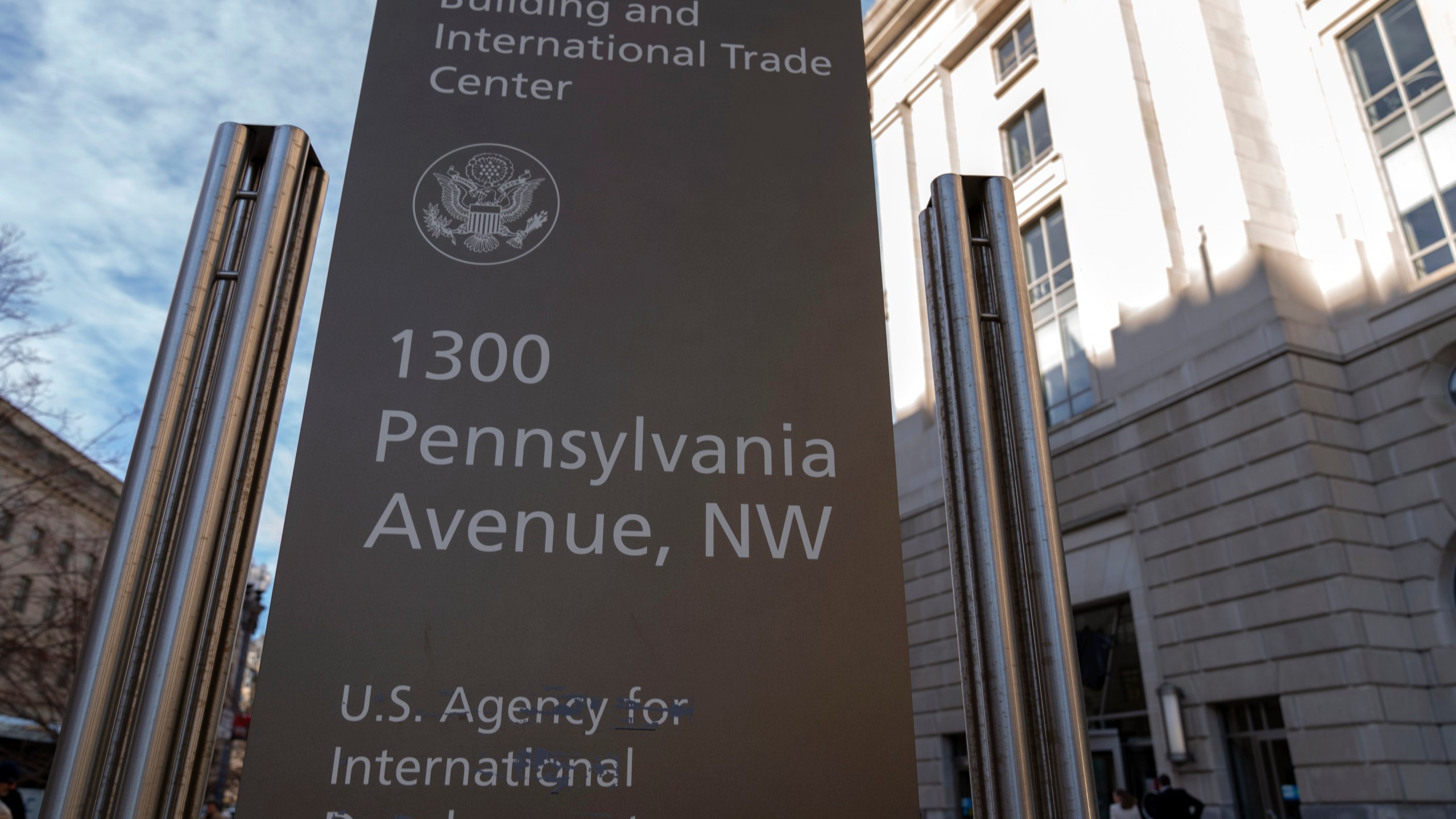 The U.S. Agency for International Development sign is seen outside of USAID headquarters in Washington, Friday, Feb. 7, 2025. (AP Photo/Jose Luis Magana)