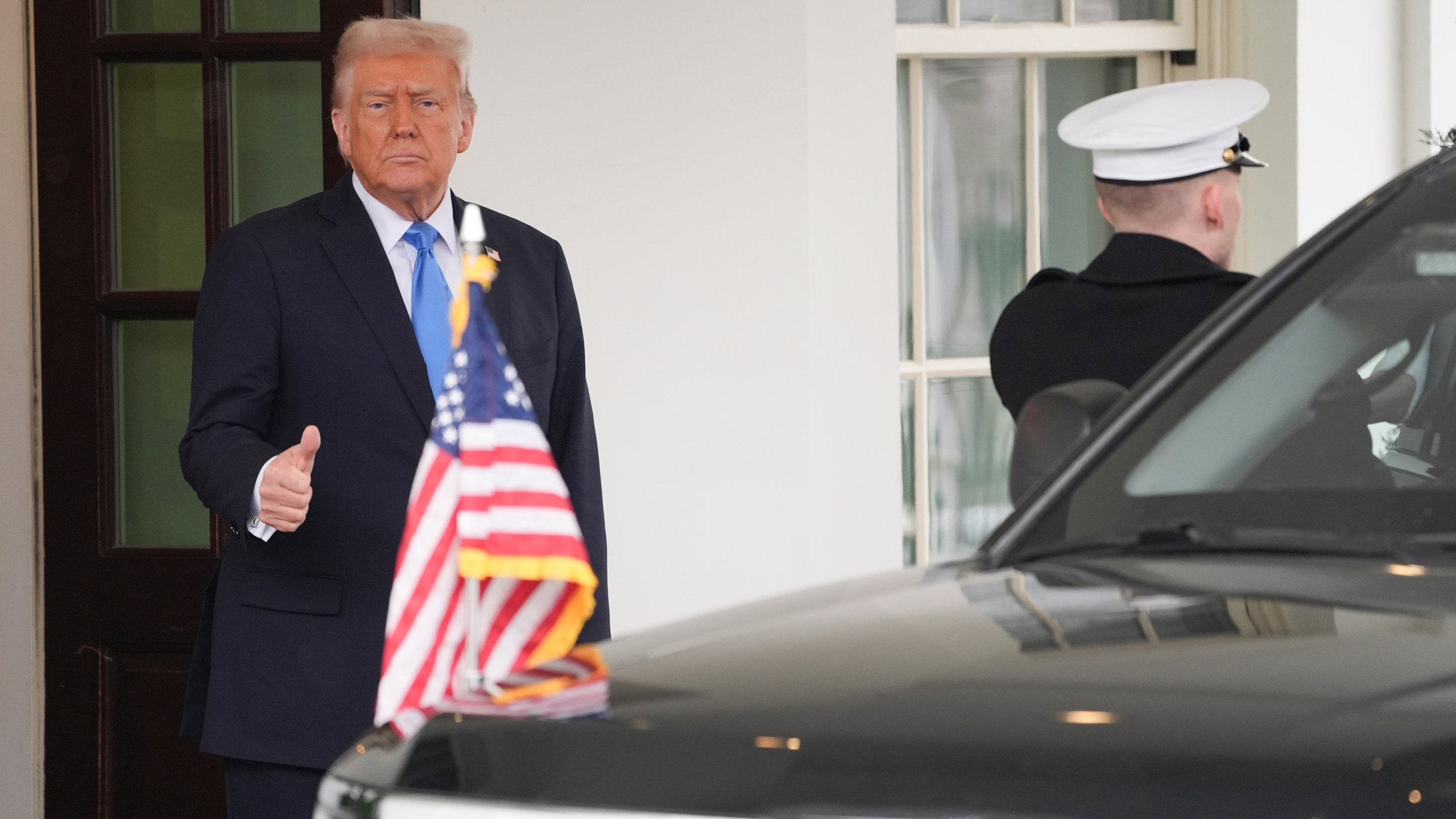 President Donald Trump gives a thumbs up as Jordan's King Abdullah II departs the White House after meeting at the White House, Tuesday, Feb. 11, 2025, in Washington. (AP Photo/Evan Vucci)