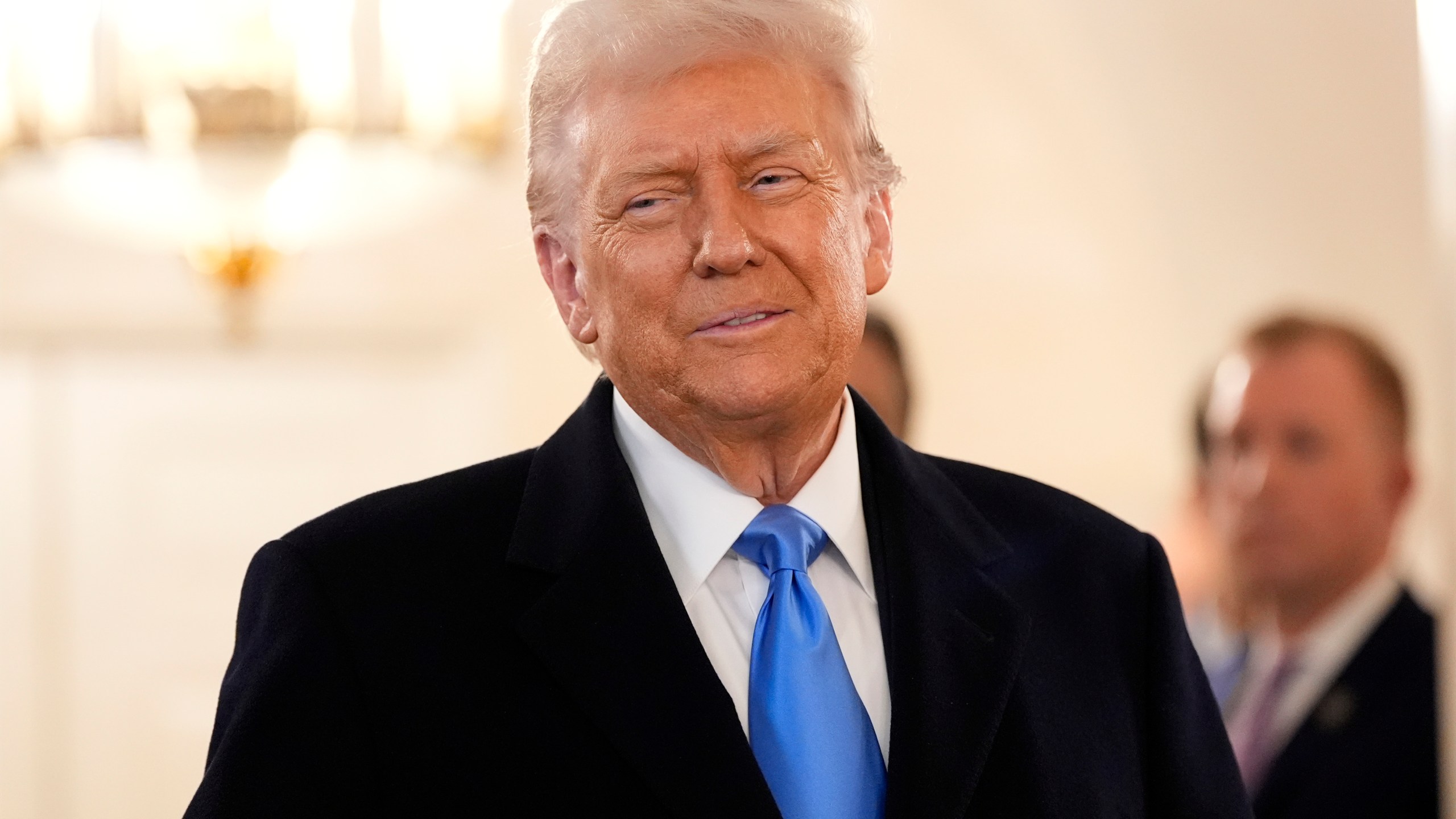 President Donald Trump arrives to greet Marc Fogel at the White House, Tuesday, Feb. 11, 2025, in Washington. (Photo/Alex Brandon)