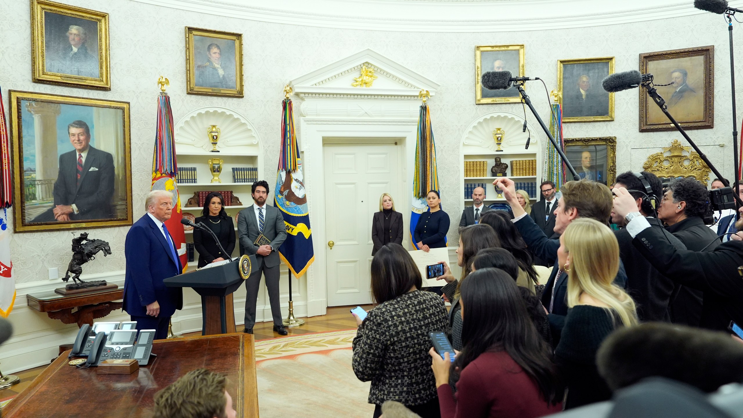 President Donald Trump speaks as Tulsi Gabbard is sworn in as the Director of National Intelligence in the Oval Office of the White House, Wednesday, Feb. 12, 2025, in Washington. (Photo/Alex Brandon)