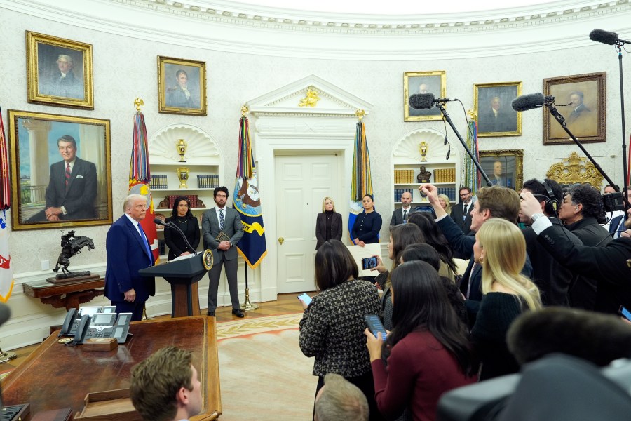 President Donald Trump speaks as Tulsi Gabbard is sworn in as the Director of National Intelligence in the Oval Office of the White House, Wednesday, Feb. 12, 2025, in Washington. (Photo/Alex Brandon)