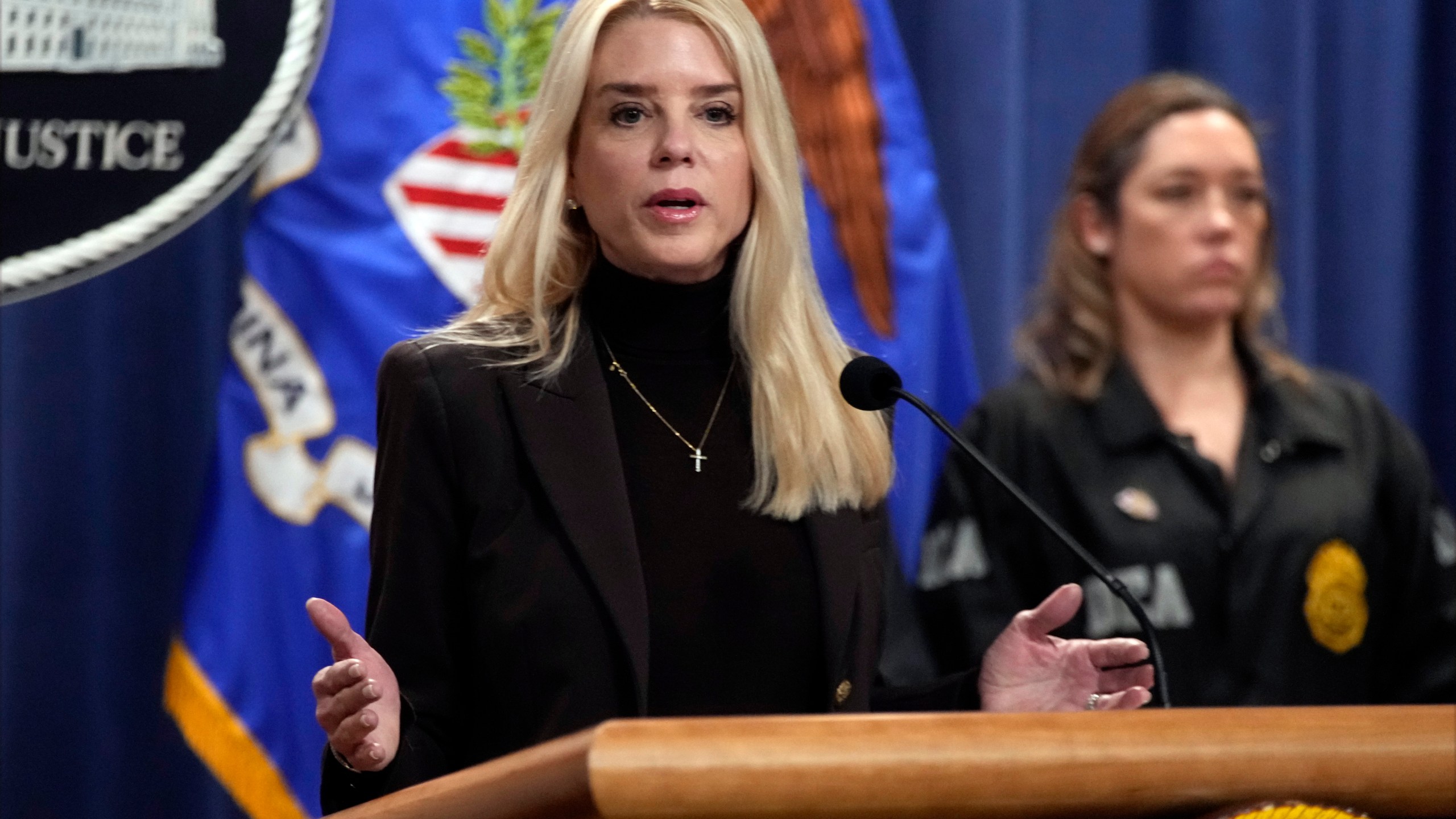 Attorney General Pam Bondi speaks at a news conference regarding immigration enforcement at the Justice Department, Wednesday, Feb. 12, 2025, in Washington. (AP Photo/Ben Curtis)