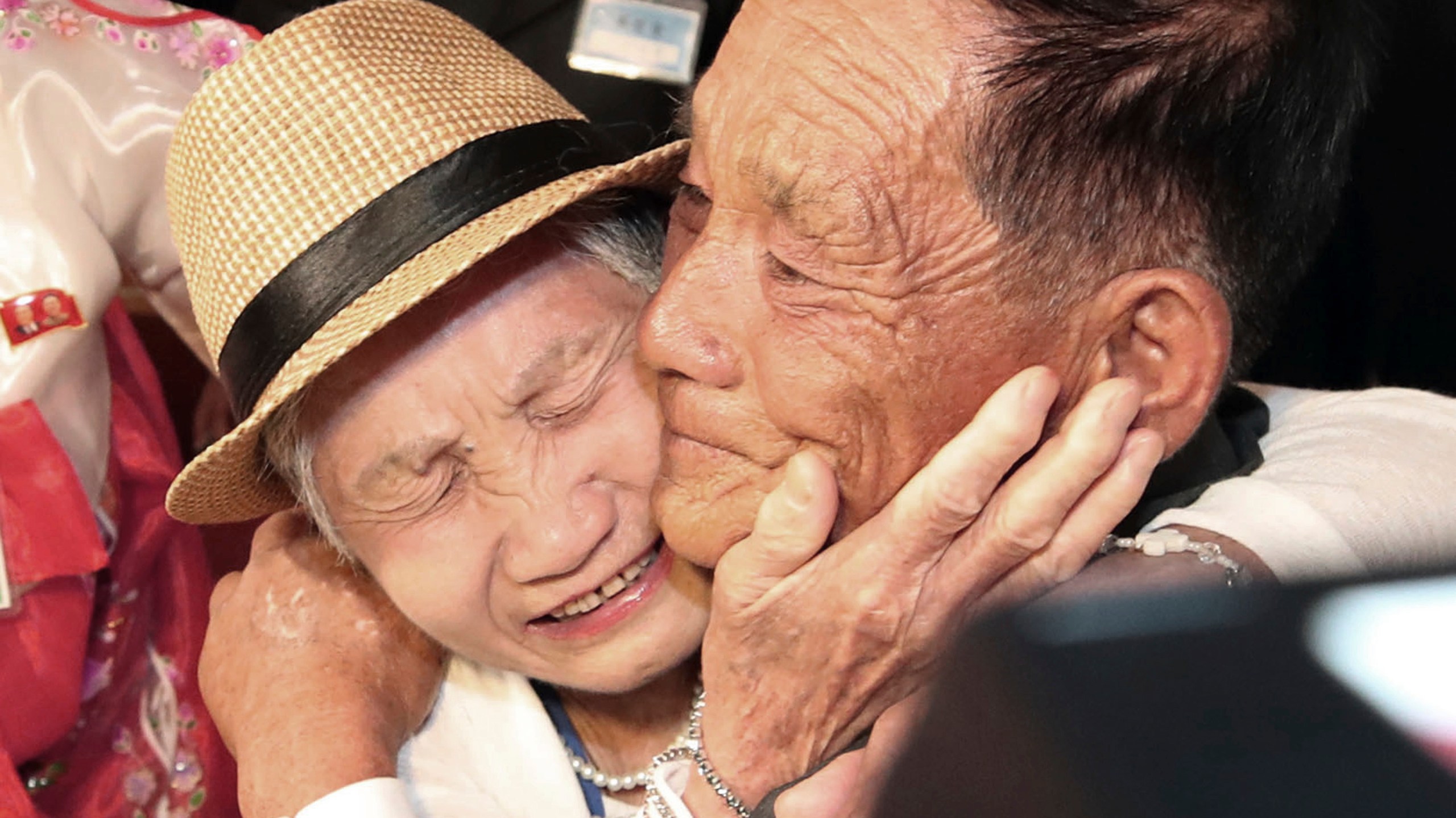 FILE - South Korean Lee Keum-seom, 92, left, weeps with her North Korean son Ri Sang Chol, 71, during the Separated Family Reunion Meeting at the Diamond Mountain resort in North Korea, Monday, Aug. 20, 2018. (Lee Ji-eun/Yonhap via AP, File)