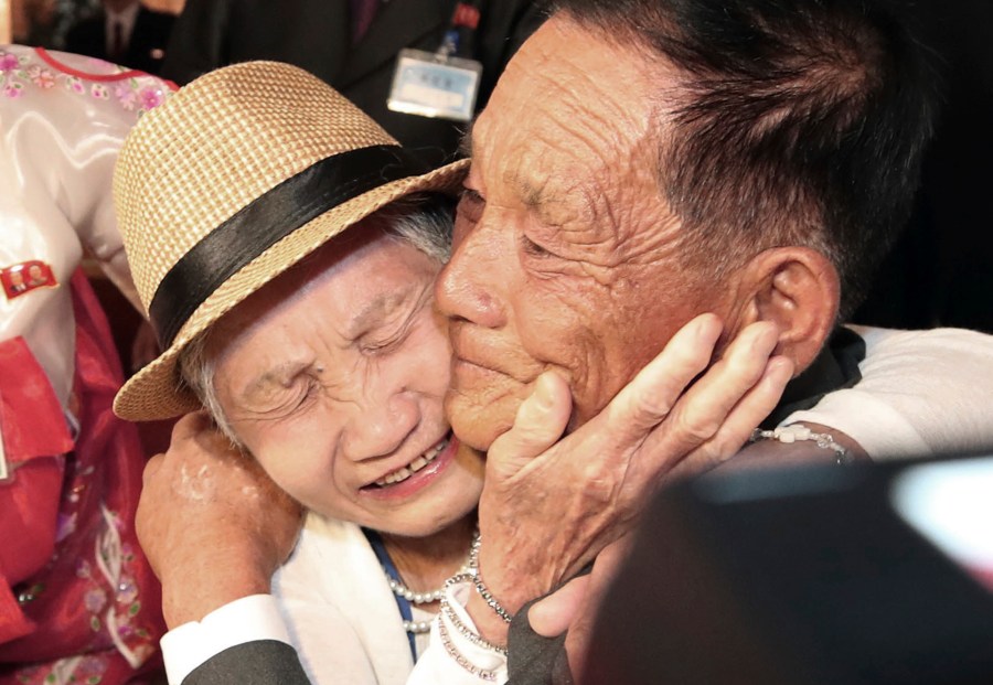 FILE - South Korean Lee Keum-seom, 92, left, weeps with her North Korean son Ri Sang Chol, 71, during the Separated Family Reunion Meeting at the Diamond Mountain resort in North Korea, Monday, Aug. 20, 2018. (Lee Ji-eun/Yonhap via AP, File)