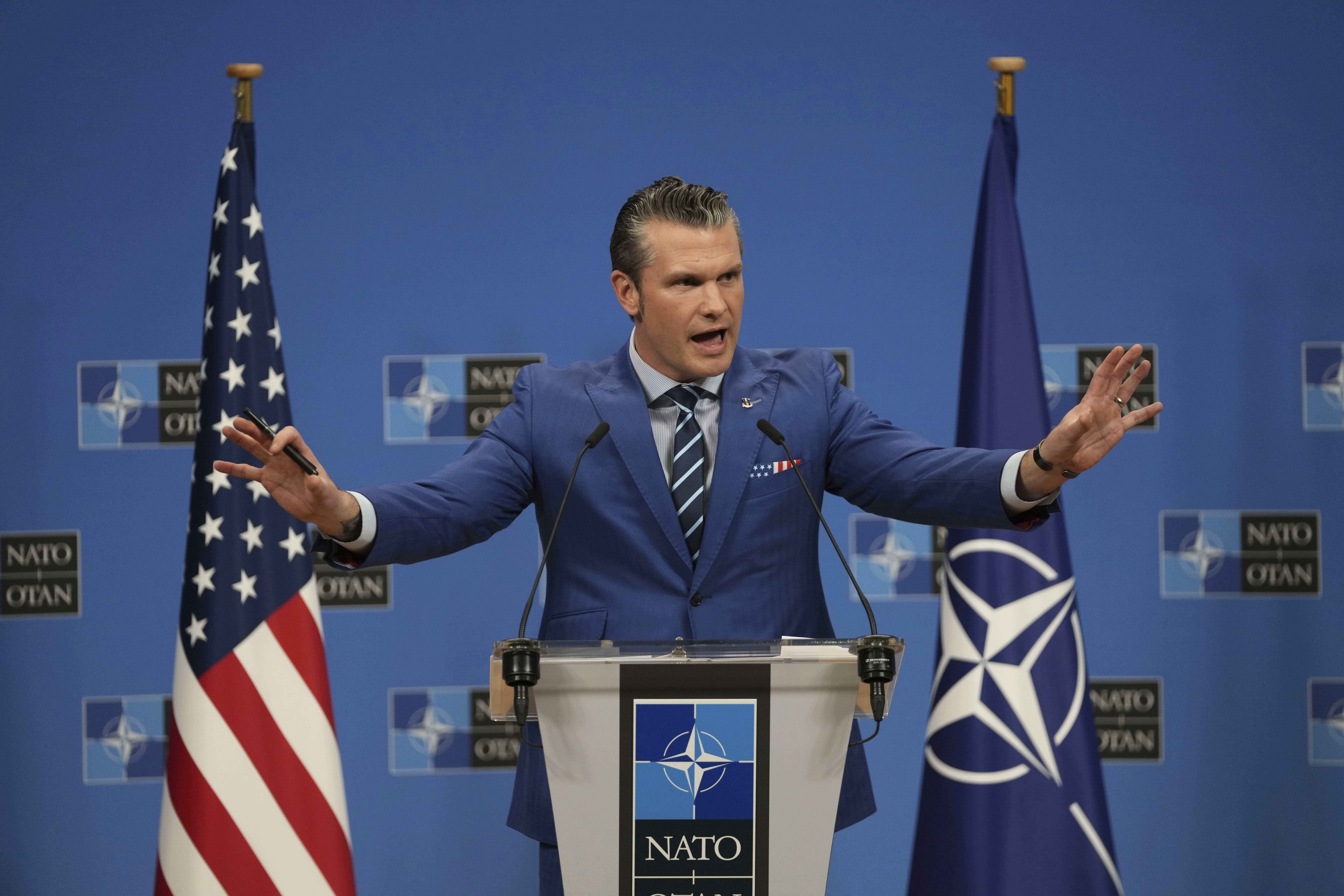 United States Secretary of Defense Pete Hegseth speaks during a media conference after a meeting of NATO defense ministers at NATO headquarters in Brussels, Thursday, Feb. 13, 2025. (AP Photo/Virginia Mayo)