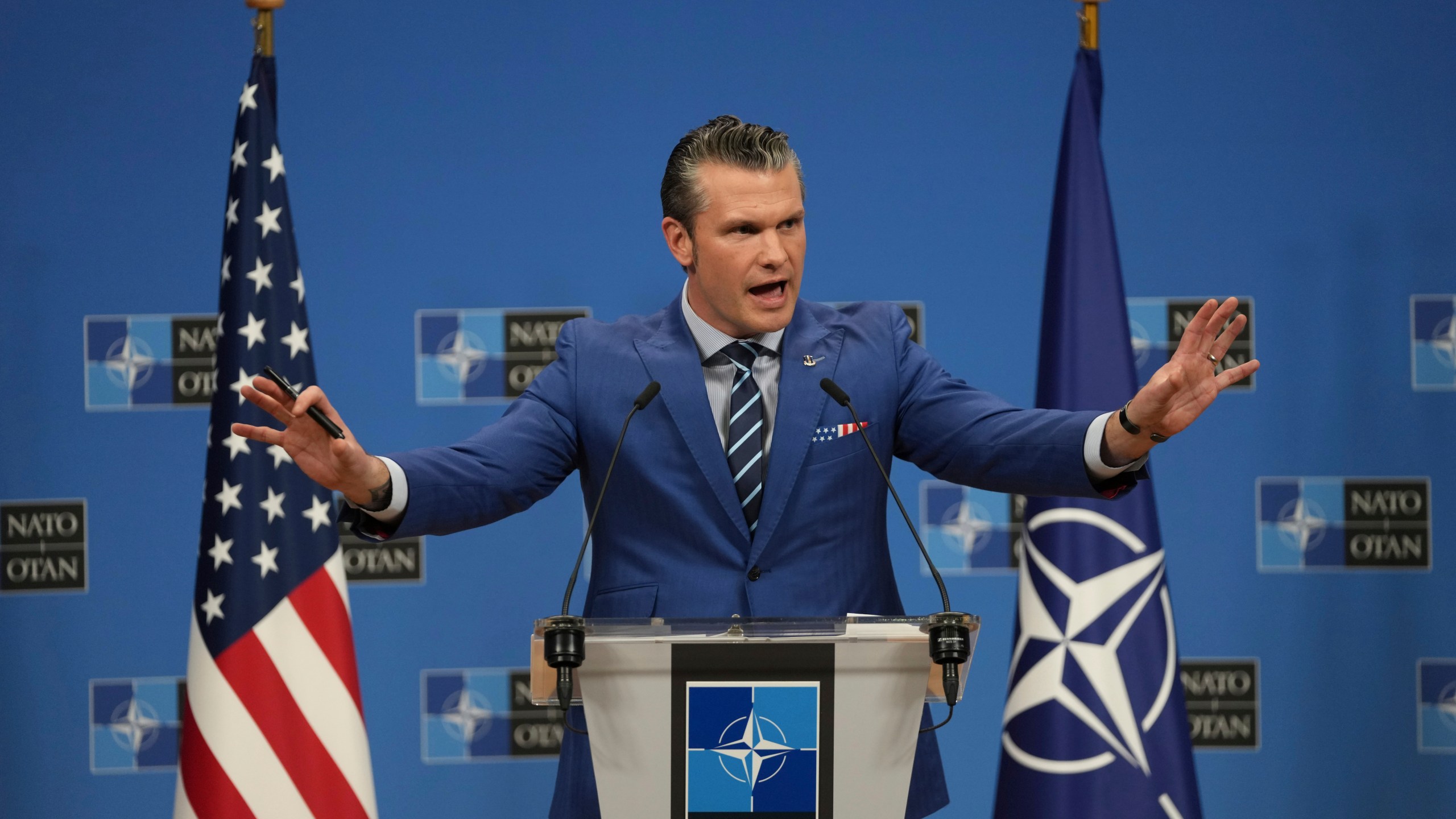 U.S. Secretary of Defense Pete Hegseth speaks after a meeting of NATO defense ministers at NATO headquarters in Brussels, Thursday, Feb. 13, 2025. (AP Photo/Virginia Mayo)