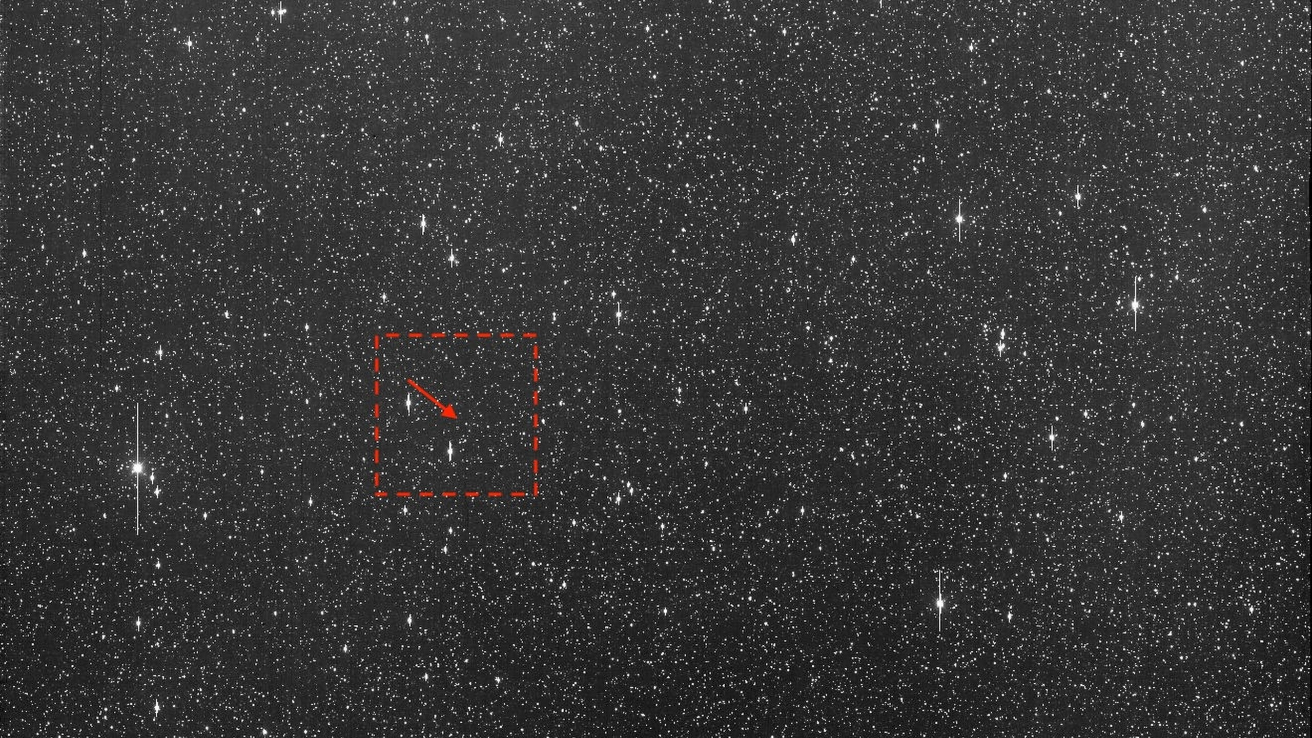 This image made available by University of Hawaii's asteroid impact alert system, shows an arrow where asteroid 2024 YR4 would be, Dec. 27, 2024. (ATLAS / University of Hawaii / NASA via AP)