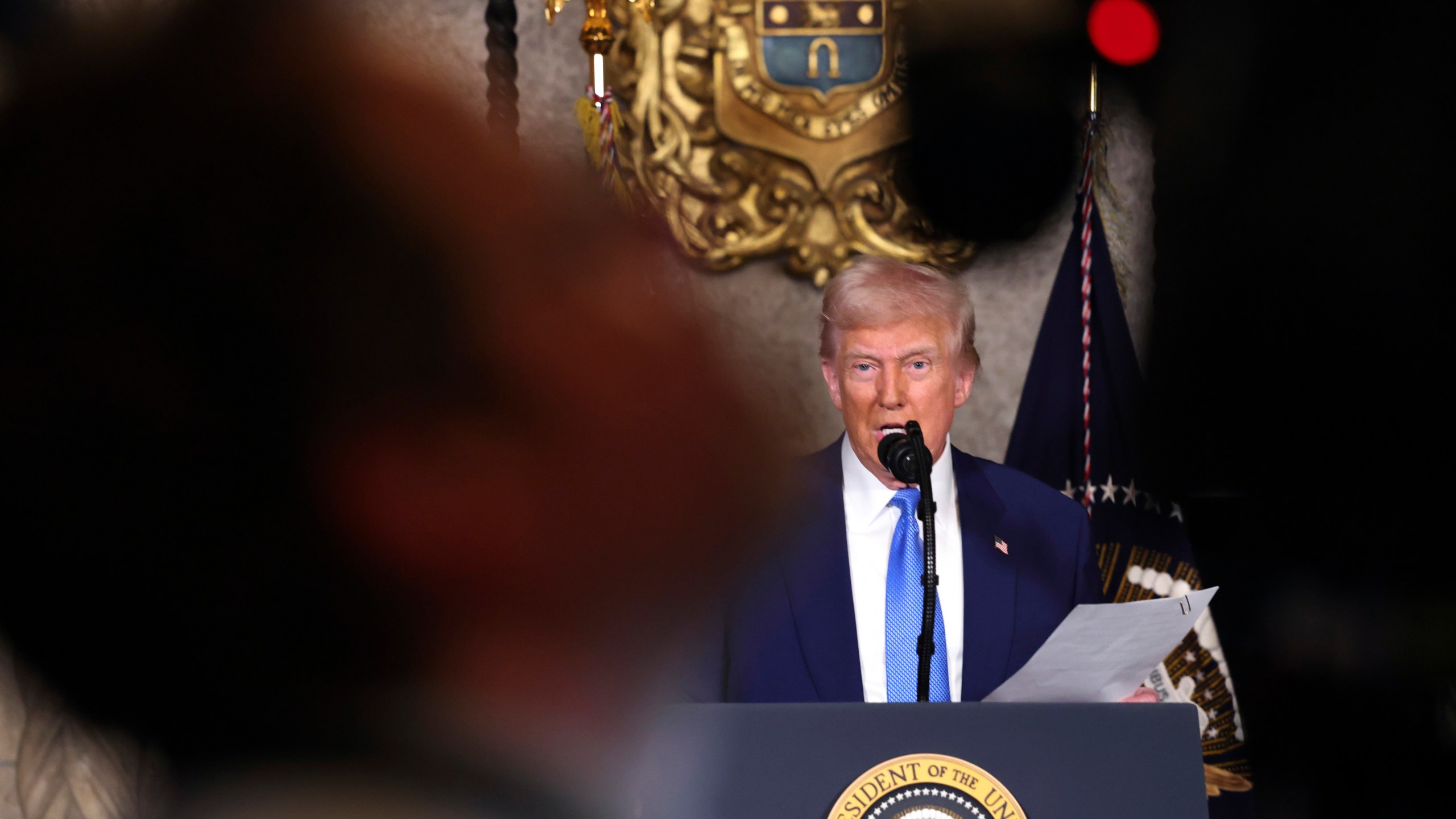 President Donald Trump speaks at Mar-a-Lago in Palm Beach, Fla., Tuesday, Feb. 18, 2025. (Pool via AP)