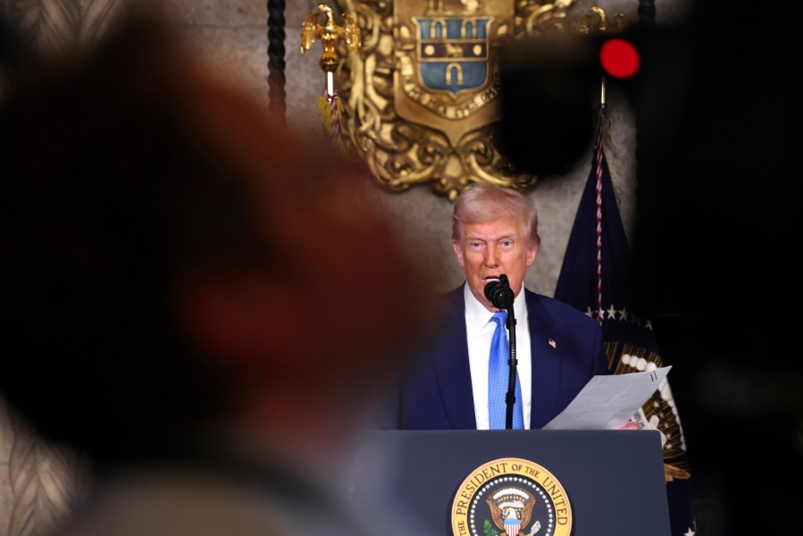 President Donald Trump speaks at Mar-a-Lago in Palm Beach, Fla., Tuesday, Feb. 18, 2025. (Pool via AP)