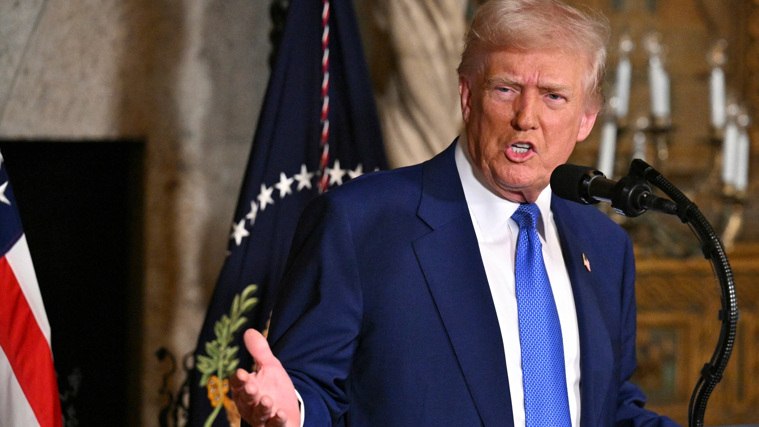 President Donald Trump speaks at Mar-a-Lago in Palm Beach, Fla., Tuesday, Feb. 18, 2025. (Pool via AP)