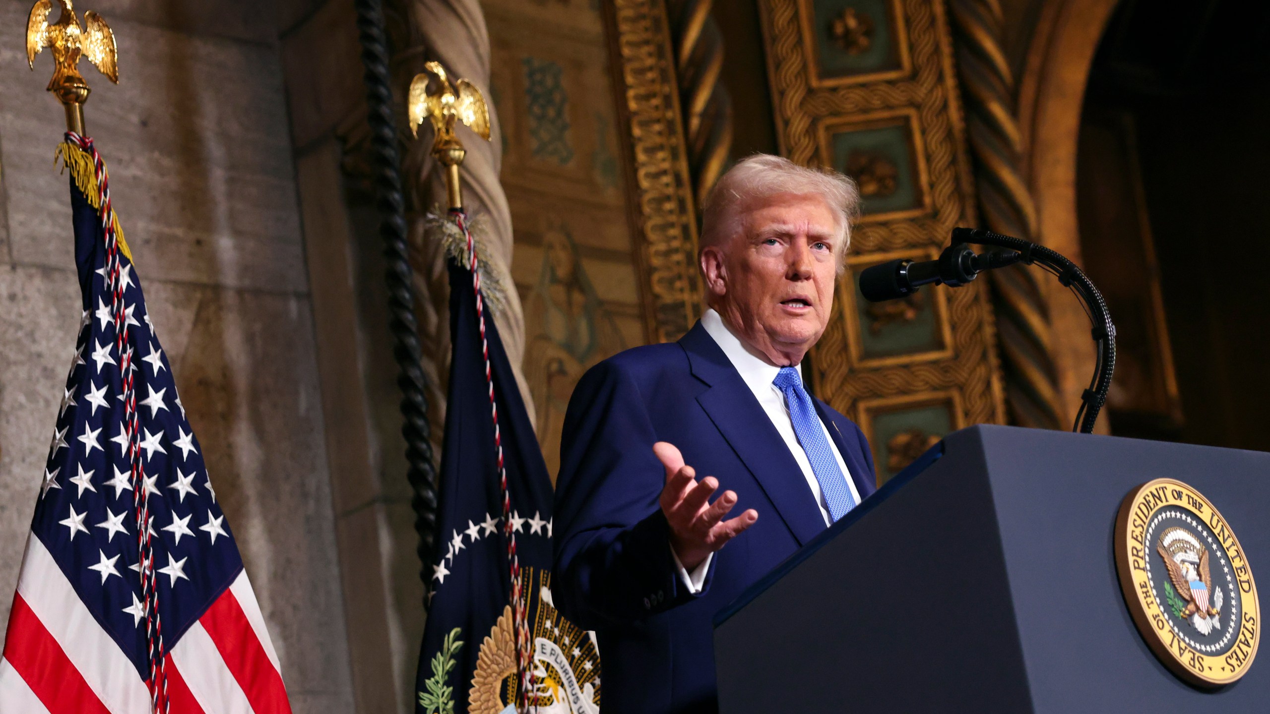 President Donald Trump speaks at Mar-a-Lago in Palm Beach, Fla., Tuesday, Feb. 18, 2025. (Pool via AP)