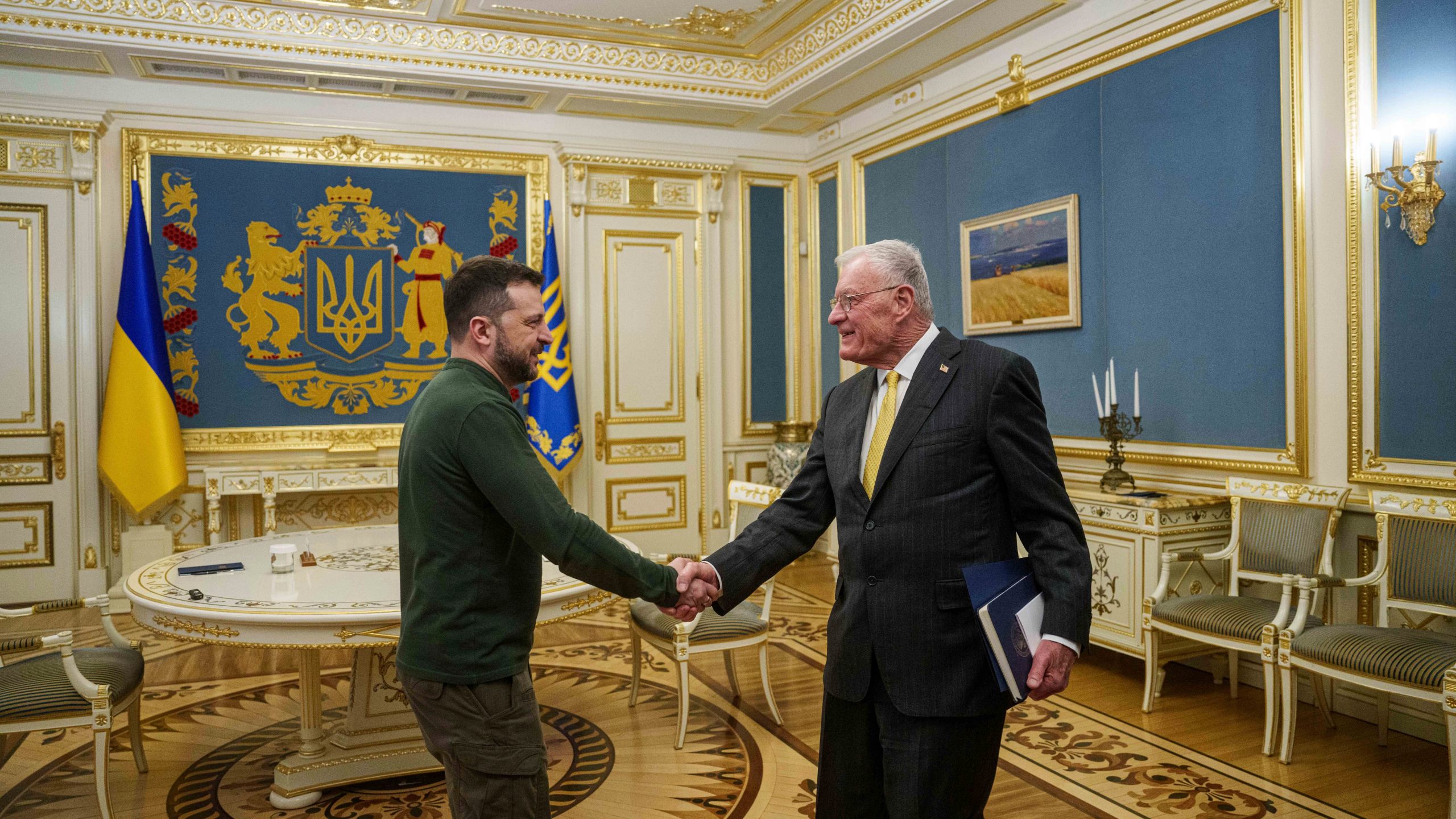 U.S. Special Envoy for Ukraine and Russia Keith Kellogg, right, and Ukraine's President Volodymyr Zelenskyy shake hands during their meeting in Kyiv, Ukraine, Feb. 20, 2025. (AP Photo/Evgeniy Maloletka)