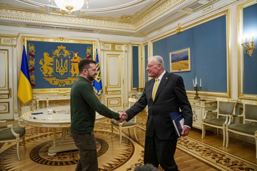 U.S. Special Envoy for Ukraine and Russia Keith Kellogg, right, and Ukraine's President Volodymyr Zelenskyy shake hands during their meeting in Kyiv, Ukraine, Feb. 20, 2025. (AP Photo/Evgeniy Maloletka)