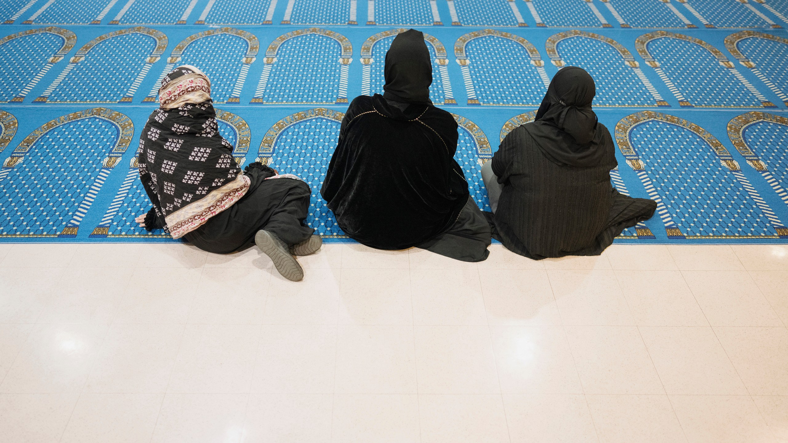 Women listen during a community gathering to discuss plans for Ramadan held for members of the Masjid Al-Taqwa at a school in Pasadena, California, Saturday, Feb. 15, 2025. (AP Photo/Eric Thayer)