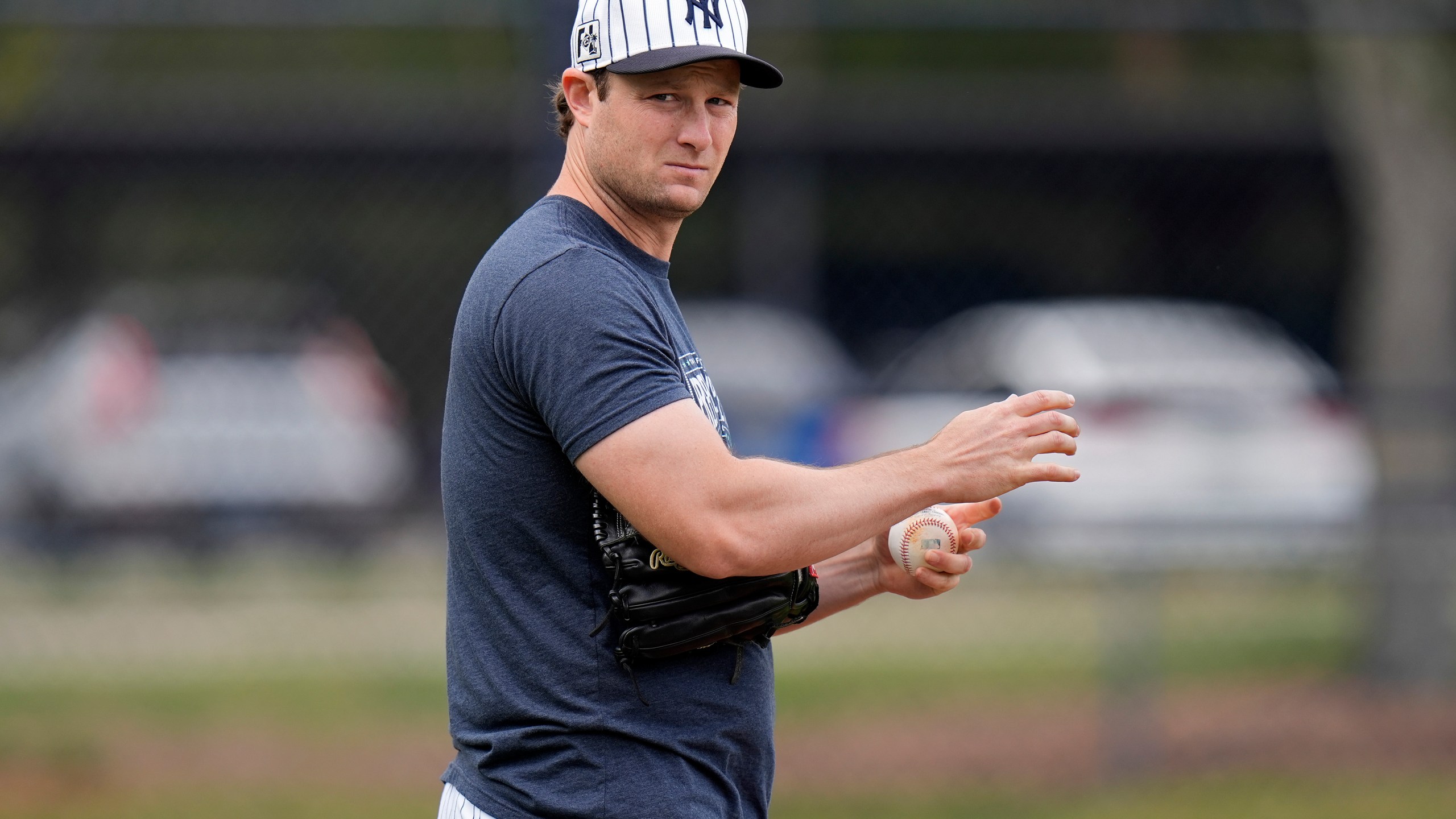 New York Yankees pitcher Gerrit Cole takes part in pickoff drills during a spring training baseball workout Thursday, Feb. 20, 2025, in Tampa, Fla. (AP Photo/Chris O'Meara)