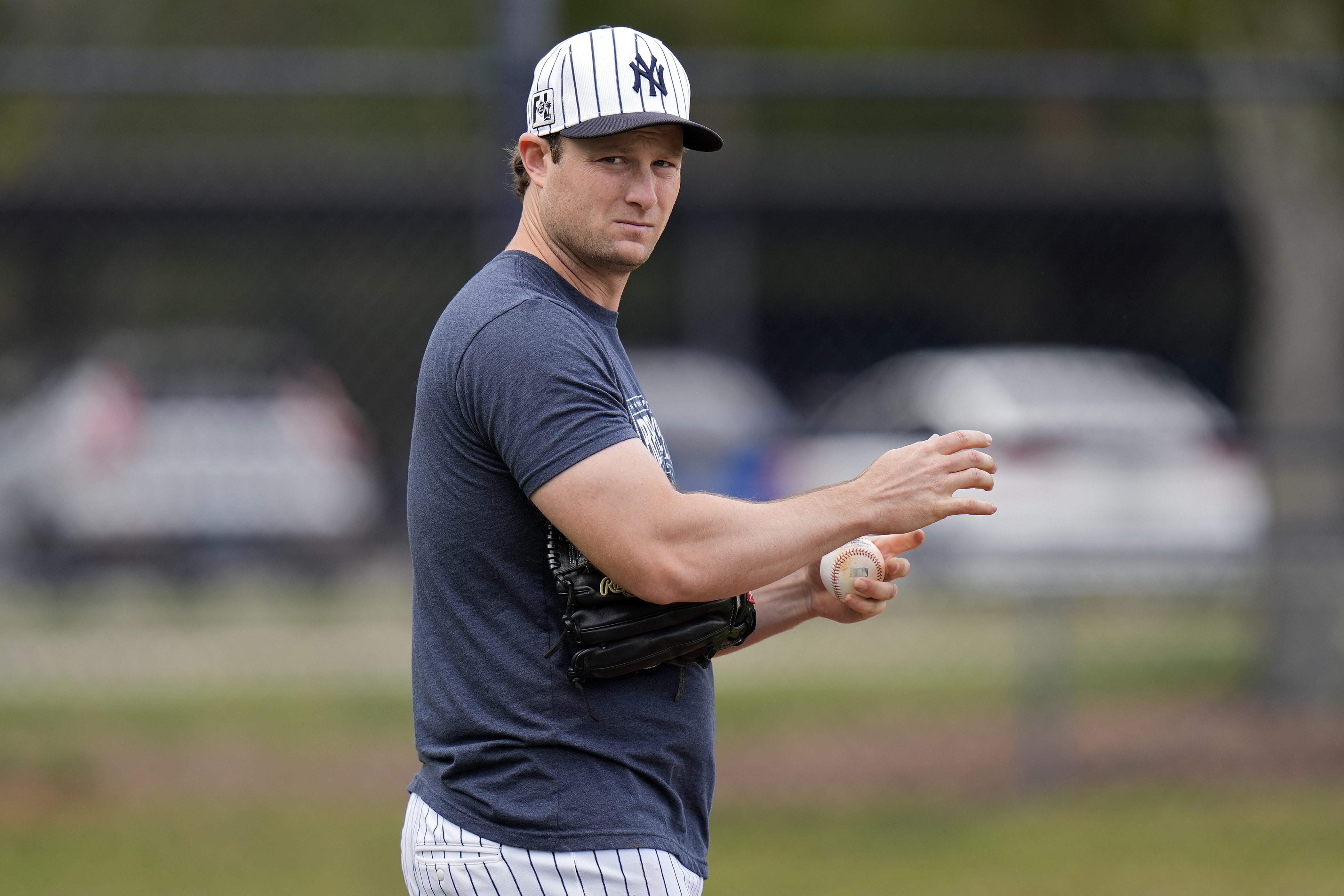 New York Yankees pitcher Gerrit Cole takes part in pickoff drills during a spring training baseball workout Thursday, Feb. 20, 2025, in Tampa, Fla. (AP Photo/Chris O'Meara)