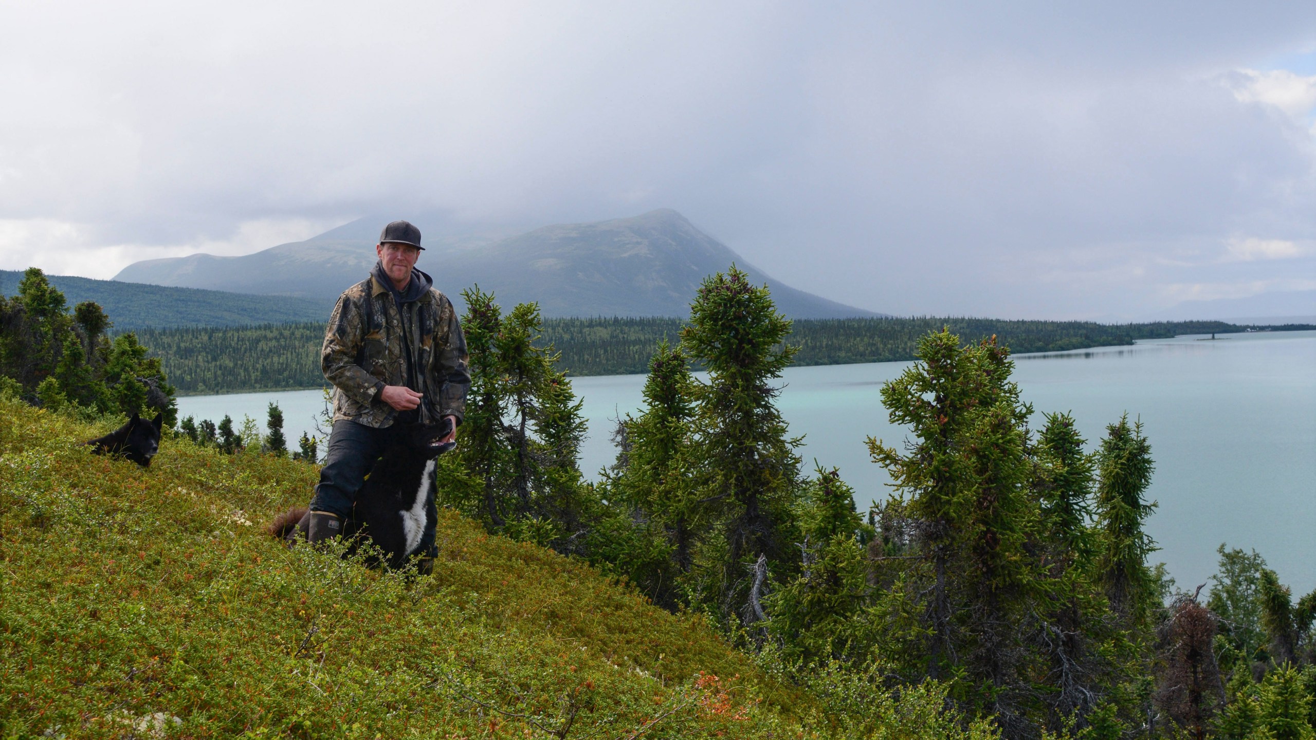 In this image provided by Beth Hill, Warren Hill poses for a photo at Lake Clark National Park and Preserve in Alaska July 15, 2018. (Beth Hill via AP)