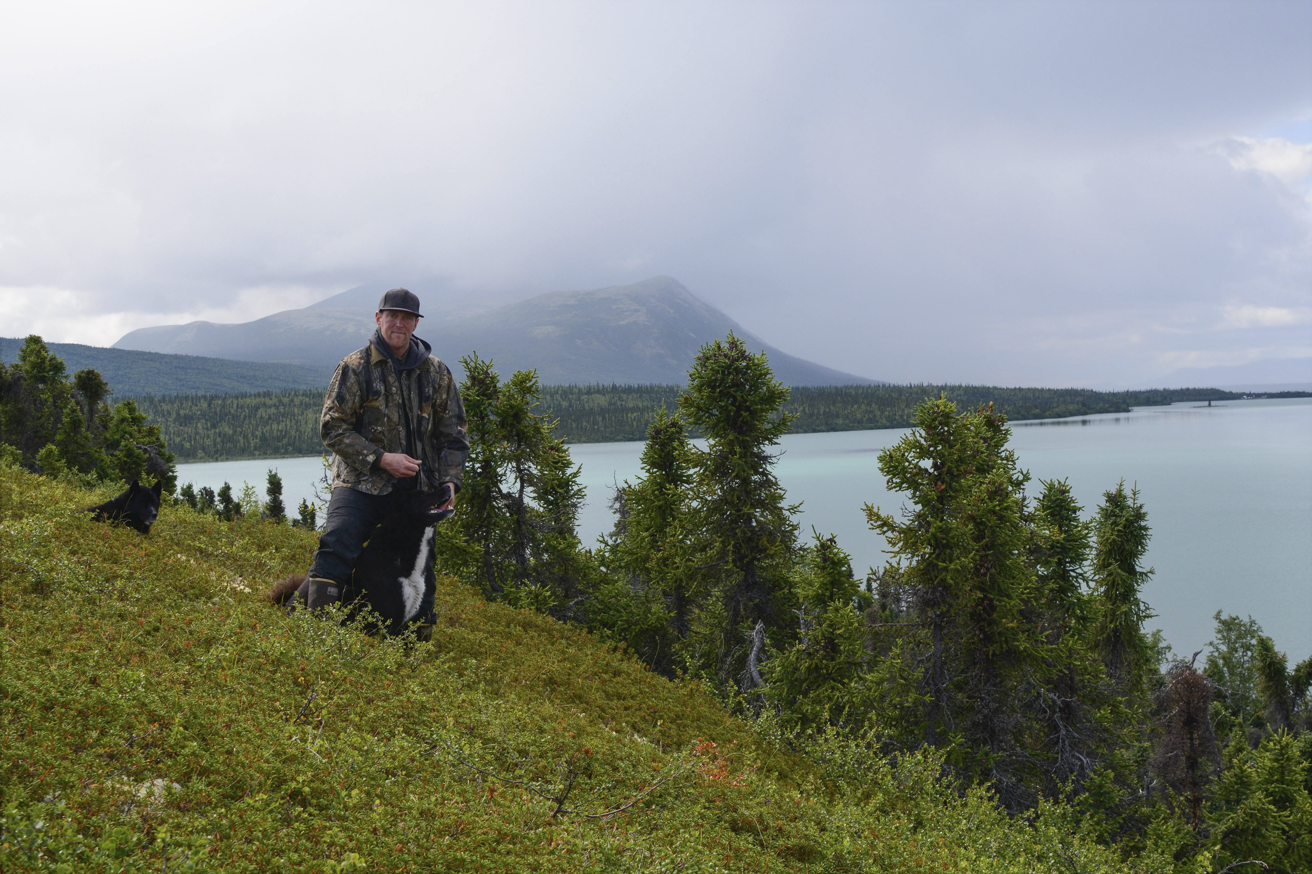 In this image provided by Beth Hill, Warren Hill poses for a photo at Lake Clark National Park and Preserve in Alaska July 15, 2018. (Beth Hill via AP)