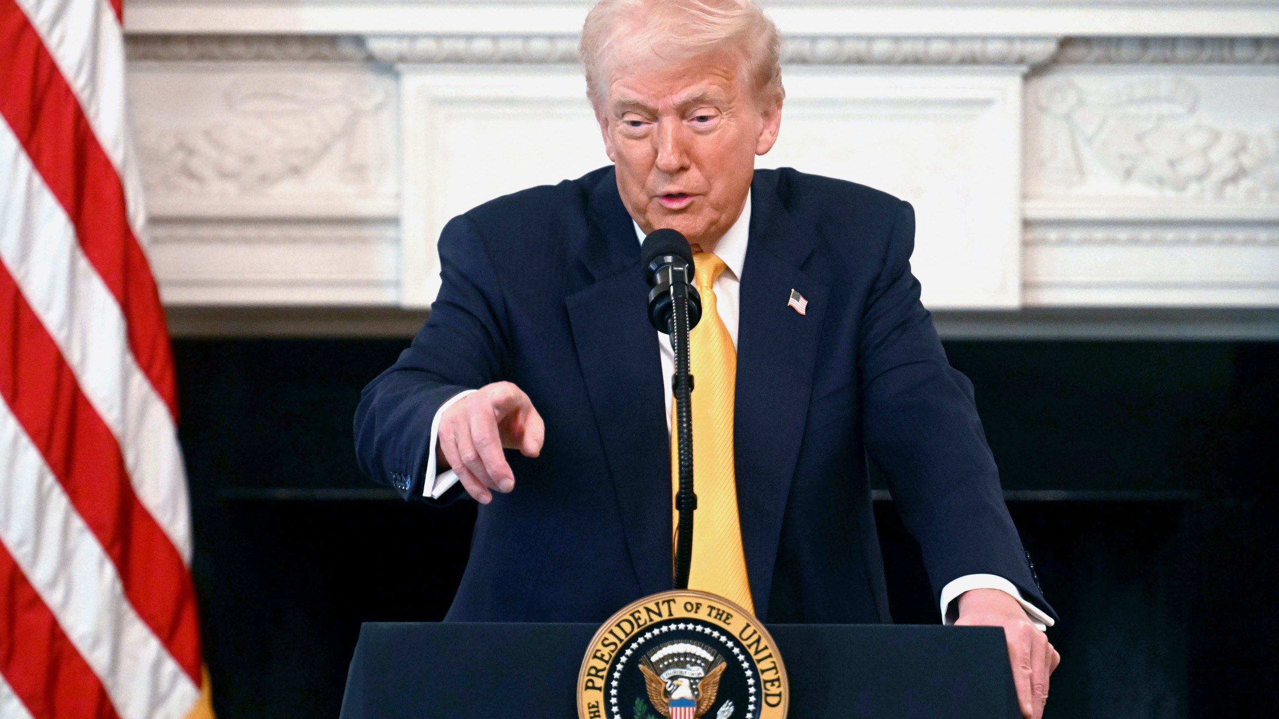 President Donald Trump speaks at the Governors Working Session in the State Dining Room of the White House in Washington, Friday, Feb. 21, 2025. (Pool via AP)