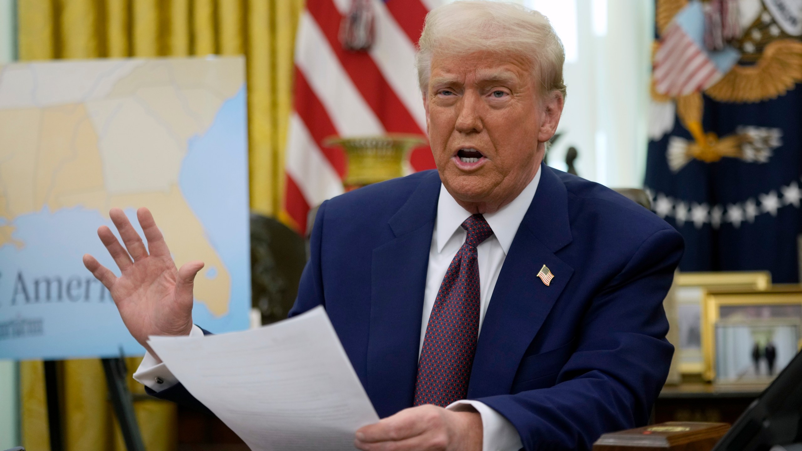 FILE - President Donald Trump speaks to reporters in the Oval Office of the White House, Feb. 13, 2025, in Washington. (AP Photo/Ben Curtis)