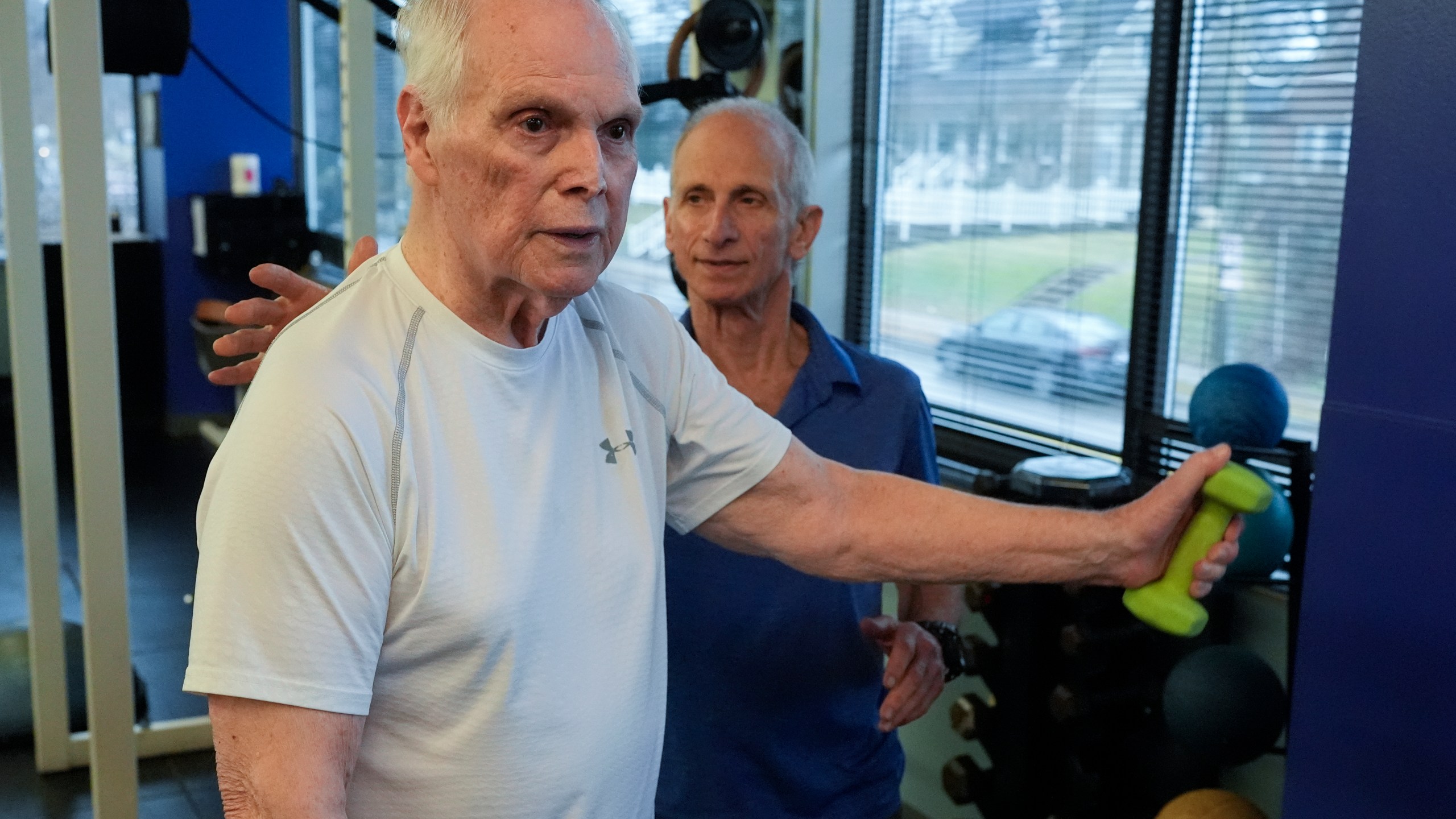 Dr. Grover Smith, left, works out with exercise scientist Dr. Irv Rubenstein, right, at STEPS Fitness, Wednesday, Feb. 12, 2025, in Nashville, Tenn. (AP Photo/George Walker IV)